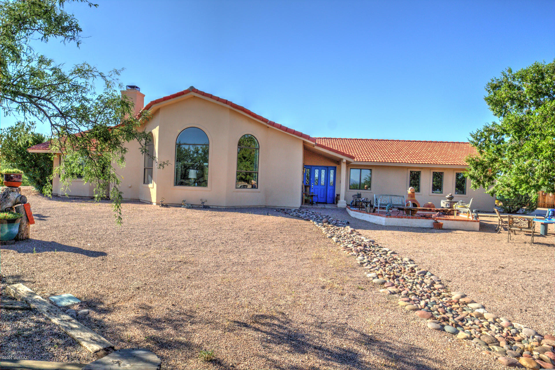 SIMPLY STUNNING panoramic views on this custom home , resting on   2.24 acres in Rio Rico .  3 bd ,2 ba, all electric , double ovens , tile roof , new water heater,  laminated wooden Pergo floors , world pool jaccuzi in master , back patio , wooden deck, fenced back yard , breakfast nook , dining area, fire place in living room, vaulted ceiling , central vacuum system, walking trail .
Beautiful mountain views . must see