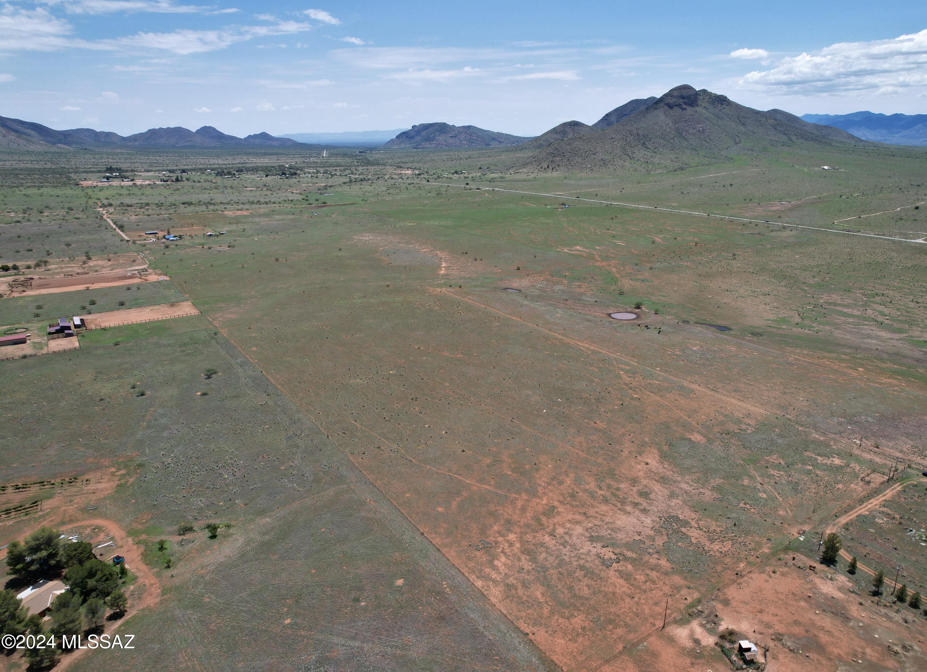Don't miss the opportunity to own 20 acres of land in AZ wine country with stunning views of the iconic Biscuit Mountain, located in the serene Mustang mountains. This picturesque property is within sight of the renowned Los Milics Winery, ranked #2 best winery by USA Today. Perfect for a homestead or ranch. Ideal location for a winery or tasting room. Potential for multiple tiny homes. Option to subdivide into smaller parcels. Buyer will have option of right of first refusal on adjacent lots. Well share agreement available. Easement access via E Rain Valley Loop Rd.