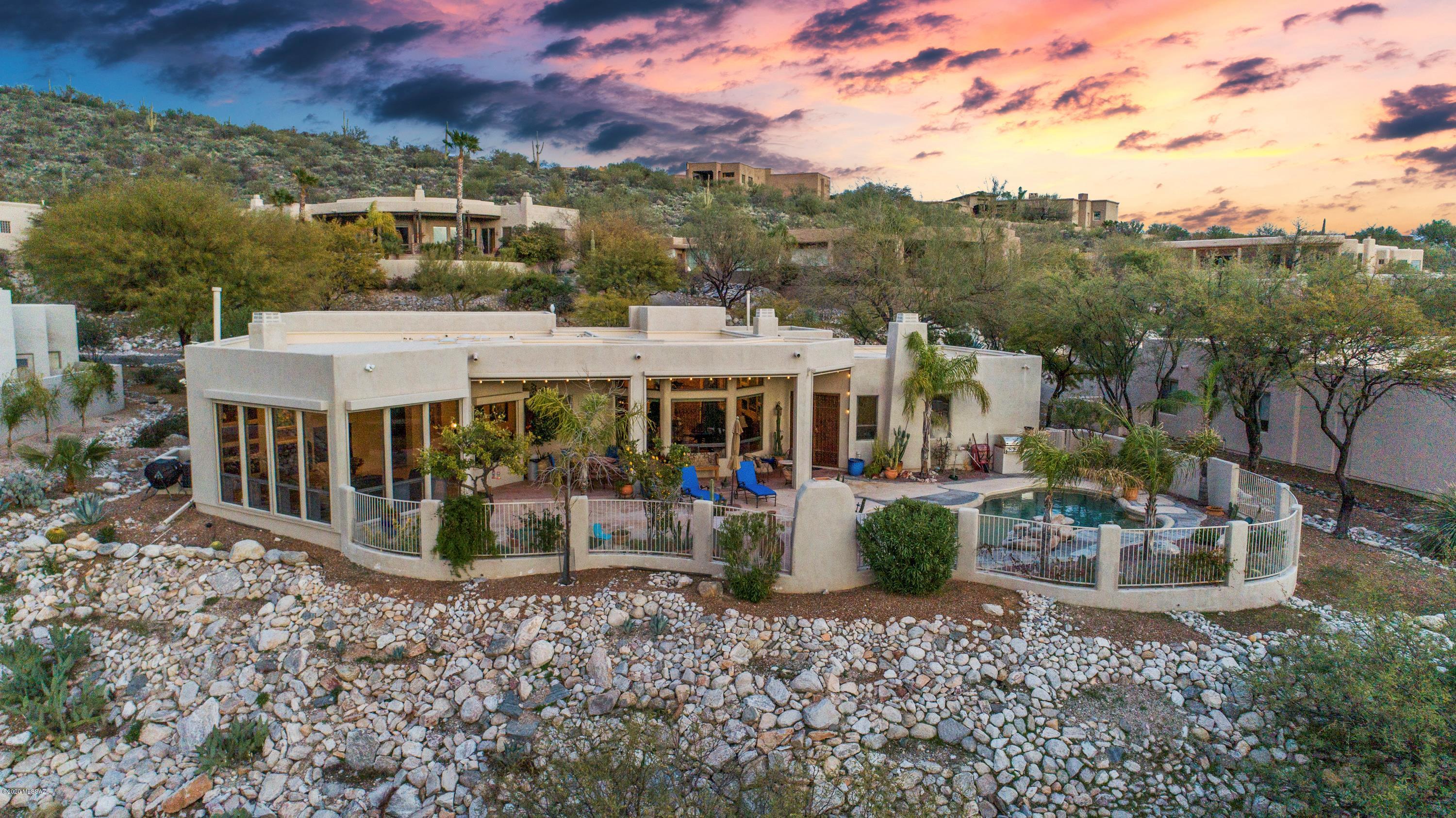 MAGNIFICENT CITY AND MOUNTAIN VIEWS FROM THIS STUNNING CUSTOM HOME BY RONDELLI. THIS HOME HAS EVERY AMENITY, GRANITE COUNTER TOPS, MAPLE CABINETRY, 18in CERAMIC TILE FLOORS, 4 FIREPLACES. WONDERFUL SPLIT BEDROOM PLAN DESIGNED TO CAPITVATE ALL THE SURROUNDING VIEWS. ENJOY THE BEAUTIFUL BACKYARD WITH BRICK PATIO, FIREPLACE, PEBBLETEC POOL, AUTOMATIC WINDOW SUN SHADES.