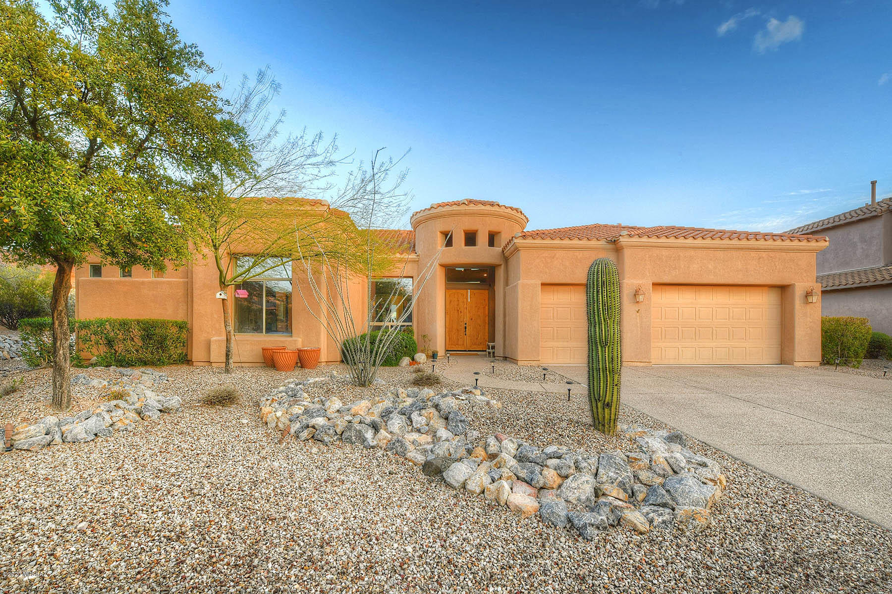 Nestled in heart of the Tucson Foothills, awaits this stunning home from one of the highest lots in the prestigious gated community of Paloma Canyon. This popular AF Sterling floorplan grew with an addition of a Bonus room and a 4th full bath. This beautifully updated home offers both intimacy and expansive entertaining. Enjoy mountain and city views from the tastefully remodeled backyard with a fabulous pool, spa, green turf and new outdoor BBQ. Chef's kitchen boasts granite counters and opens to family and living room. The oversized master bedroom has his & her closets. See full list of recent updates and upgrades under documents. This home is the one not to miss!