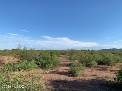 Beautiful lot located ten minutes outside of the quaint town of Bisbee, close to the Cochise college and Border Patrol station. Cross fenced with horse corrals in the rear, and electric on the east lot line. This is a great opportunity for a buyer intested in owning their own piece of the wild west!