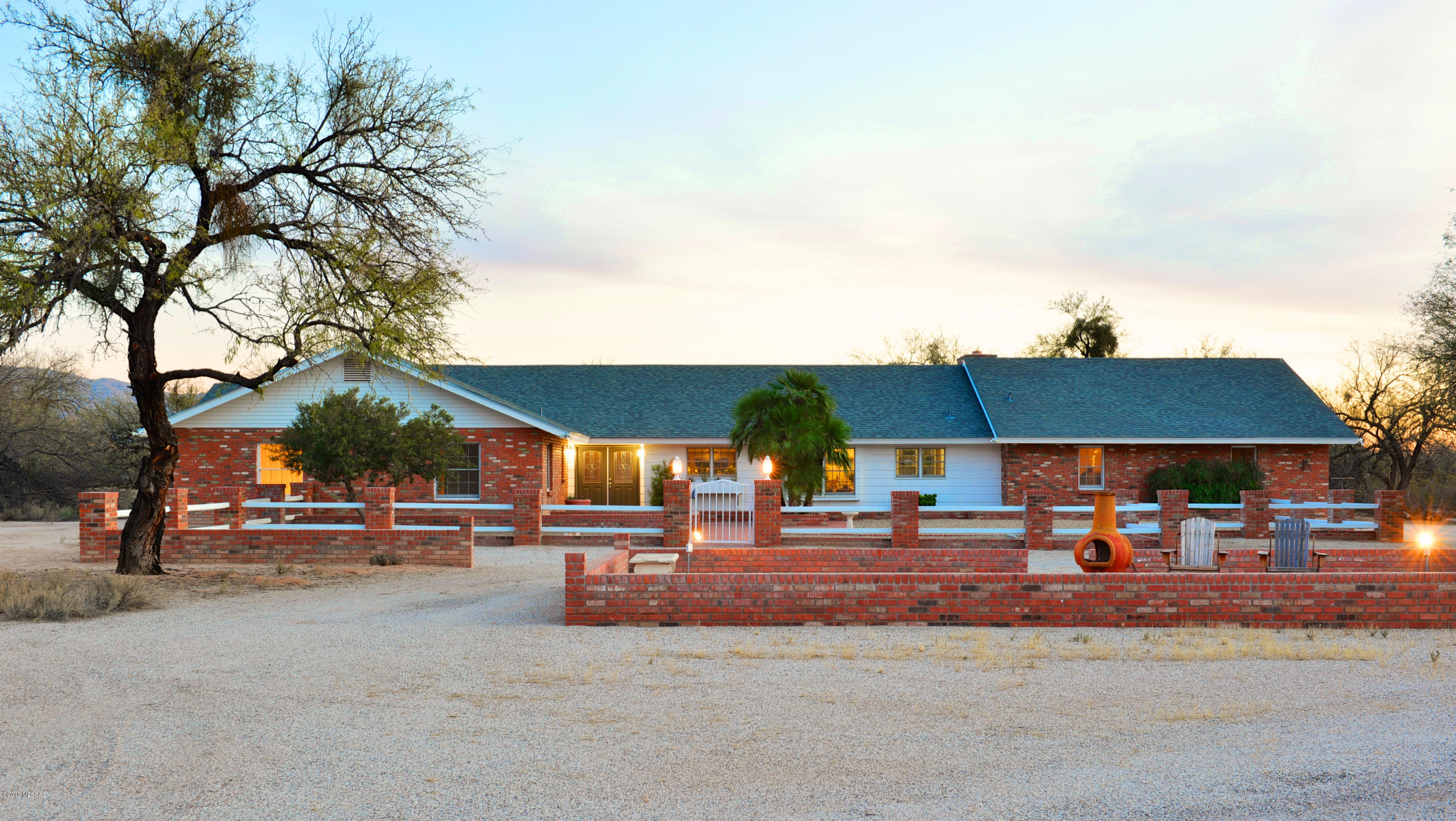 Seller entertaining offers between $799,999 to $899,999. Welcome to Sweet Mesquite Ranch in North East Tucson! A ranch of fusion between horse lovers and car enthusiast! Completely and lovingly remodeled with all the most magnificent upgrades available. This spectacular ranch boasts jaw dropping views of the Catalinas and privacy galore in this mesquite bosque haven. Pool, horse stables, room for arena and a 12+ car garage with workshop that is a Barrett Jackson's dream, and RV space for the traveler in you! Property has a private well & city water. Bonus room off of the home is perfect for a private office with separate parking. Exquisite home has spa like bathrooms and oversized bedrooms. Gourmet chef's dream kitchen is an entertainer's delight at Sweet Mesquite Ranch! Welcome Home!!!