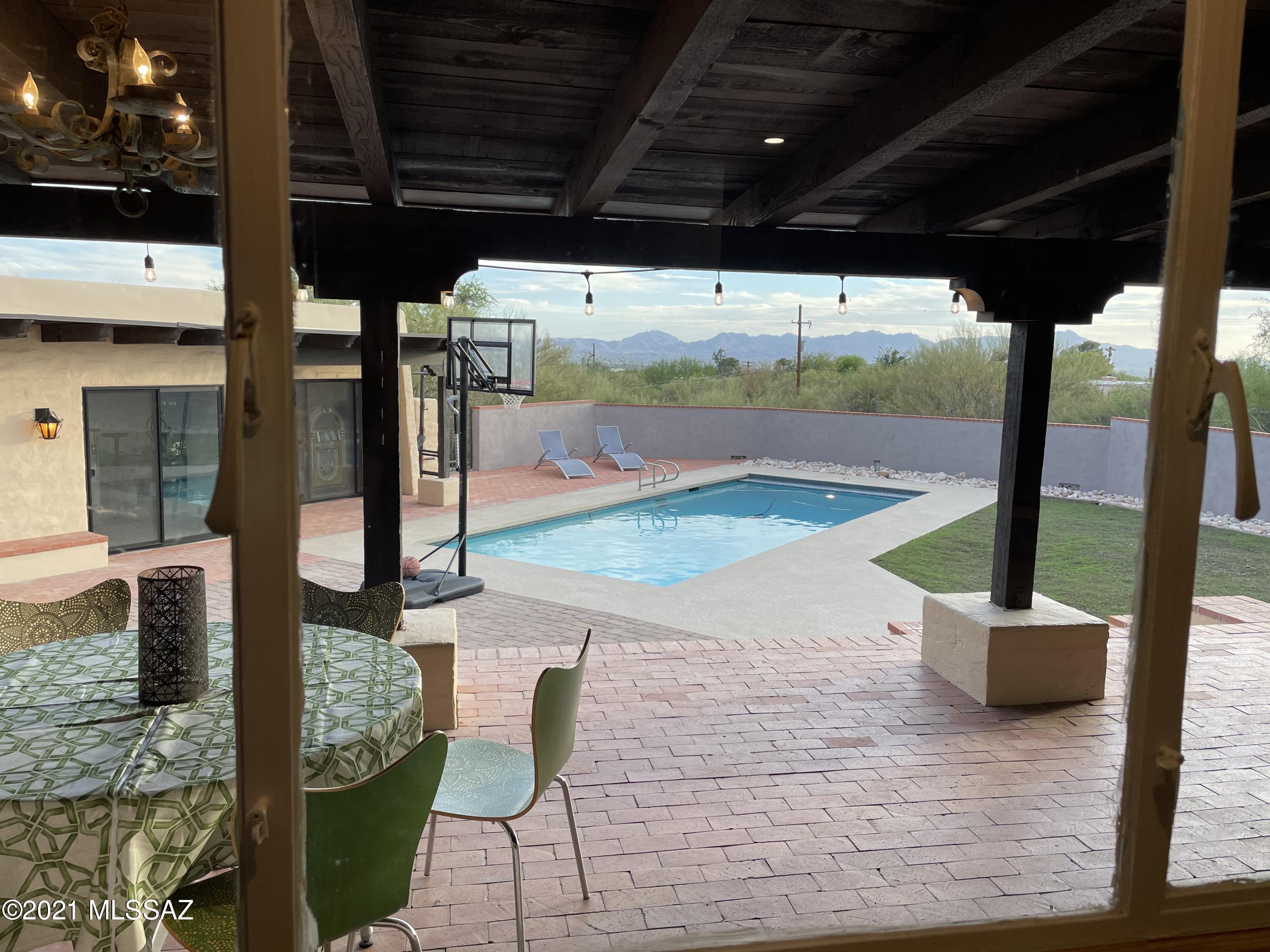 Beautiful 4 bedroom, 2 bathroom home located on a quiet cul-de-sac in the Foothills.  Full 1 bedroom, 1 bathroom Guest house overlooking the backyard and pool area.  Listing will be live on 6/24.  Contact Rebecca Crane with any questions at 520-271-0073.