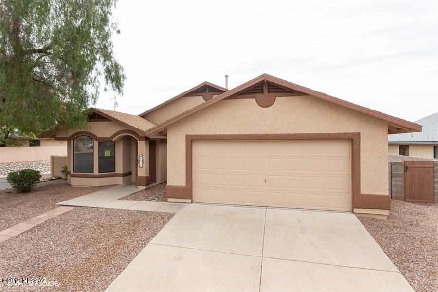 This is a Fannie Mae HomePath Property! With 1914 sq ft of living space, this home has 4 bedrooms, 2 bathrooms, family room with fireplace, formal dining, laundry room, 2 car garage, & large backyard with covered patio great for entertaining. Spacious kitchen with island, plenty of cabinet space, & dining/breakfast area. Large master bedroom with walk-in closet, & master bathroom with garden tub & walk-in shower. <FONT COLOR=RED>Recently painted interior & exterior with two tone paint, installed NEW flooring, NEW stainless steel kitchen appliances, & NEW granite counter tops. </FONT> Located close  to I-10, shopping, restaurants, schools and much more! Attention First Time Buyers: complete the HomePath Ready Buyer homeownership course. Attach certificate to offer and request up to 3% closing cost assistance. Ask Agent for more details. Restrictions apply.