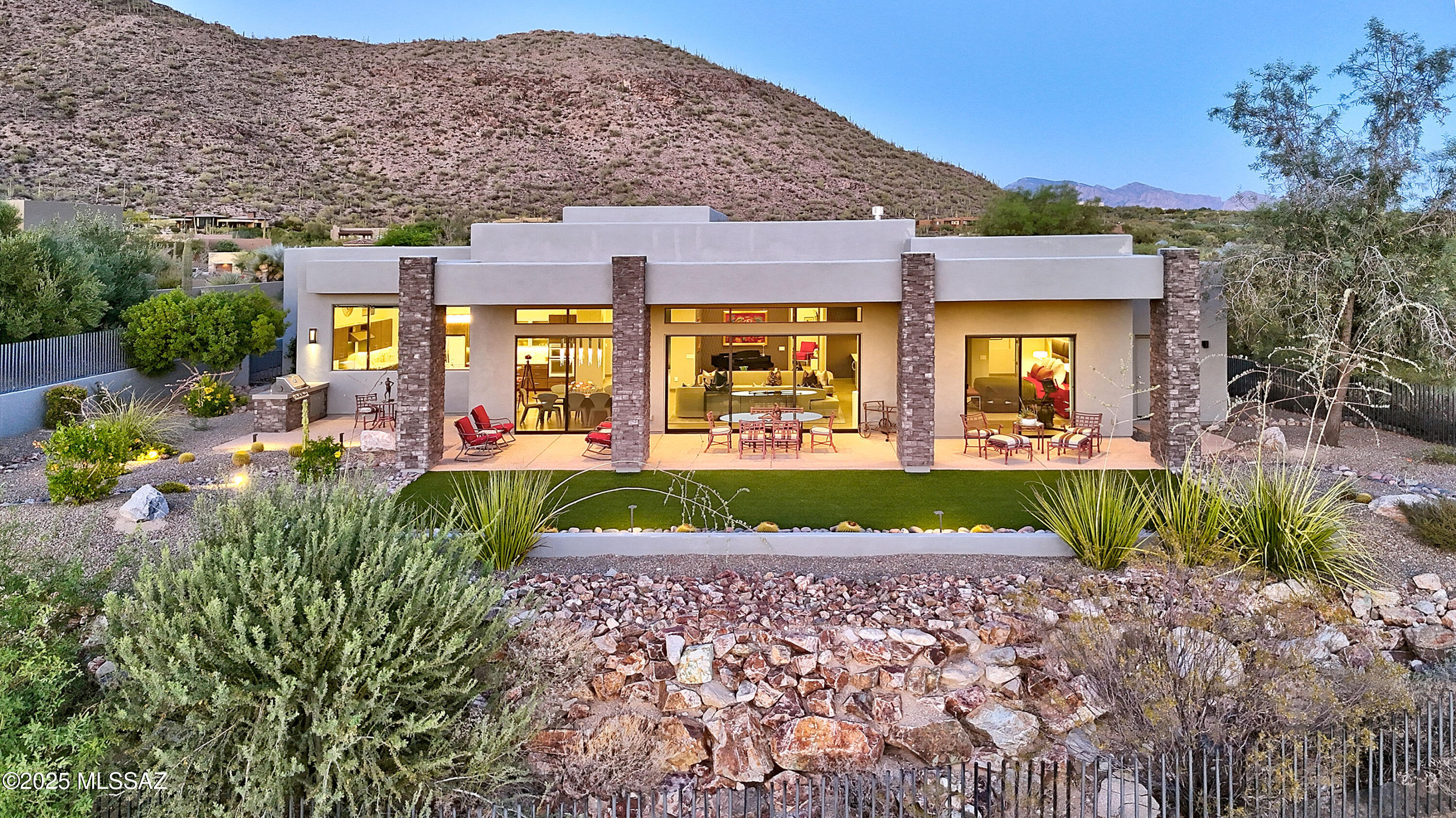 * CONTEMPORARY ELEGANCE* EXQUISTE ''MODERN'' ESTATE... PERCHED ON HILLSIDE OVERLOOKING 13TH FAIRWAY @''THE GALLERY '' NORTH COURSE IN THE FTHLLS OF THE  TORTOLITA MTNS BREATHTAKING SUNSET & MTN VIEWS! TASTEFULLY DECORATED BY AWARD WINNING LORI CARROLL DESIGNS- SOPHISTICATION & TIMELESS STYLE ALONG W/SELLERS ARTISTIC FLAIR CREATE A VERY UNIQUE RETREAT!   WALLS OF WINDOWS BRING THE BEAUTY OF THE SONORAN DESERT INDOORS! AMAZING GREAT RM- STUNNING FP, WET BAR/RM FOR BABY GRAND...OR CASUAL WINE BAR! FABULOUS GOURMET KIT- ENORMOUS ISLAND, ITALIAN GAS STOVE/OVENS- CLEAN WHT QUARTZ CTRS!
*CUSTOM FURNISHINGS ARE AVAILABLE FOR SEPERATE BILL OF SALE* DESIGNED & PURCHASED FOR THIS HM- TURN KEY!  JUST BRING YOUR SUITCASE! ENJOY LIFE @DOVE MTN  HIKING/BIKING/GOLF/FITNESS CC/RITZ CARLTON RESORT