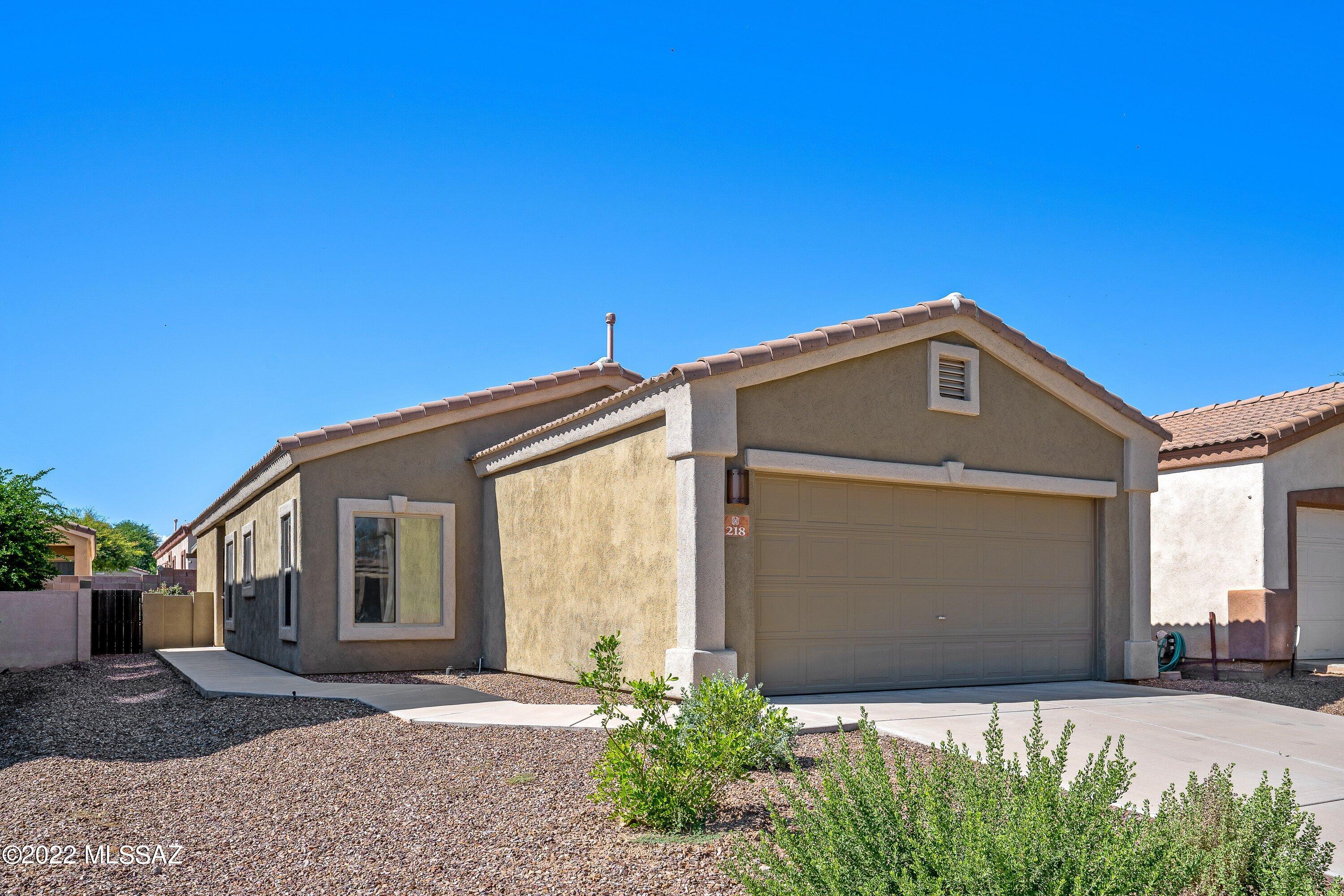 Range Price $285,000 to $305,000, seller will entertain or counter offers between range. This beauty is move in ready!  Welcoming neutral color palette throughout.  Bright & open, 3 bed, 2 bath, split bedroom plan. Large kitchen offers plenty of workspace, quartz like counters, white cabinets, s/s appliances.  Opens to dining area & great room to make entertaining a breeze.  Great room opens to covered patio and garden area.  Ceiling fans throughout.  All this plus Owned Solar!!  See TEP consumption history in documents. What a fantastic advantage to have owned solar with low electric bills!  Enjoy Rancho Sahuarita living at it's best!  Seller will convey AHS Silver Shield home warranty to buyer at COE, warranty expires 09-02-23.