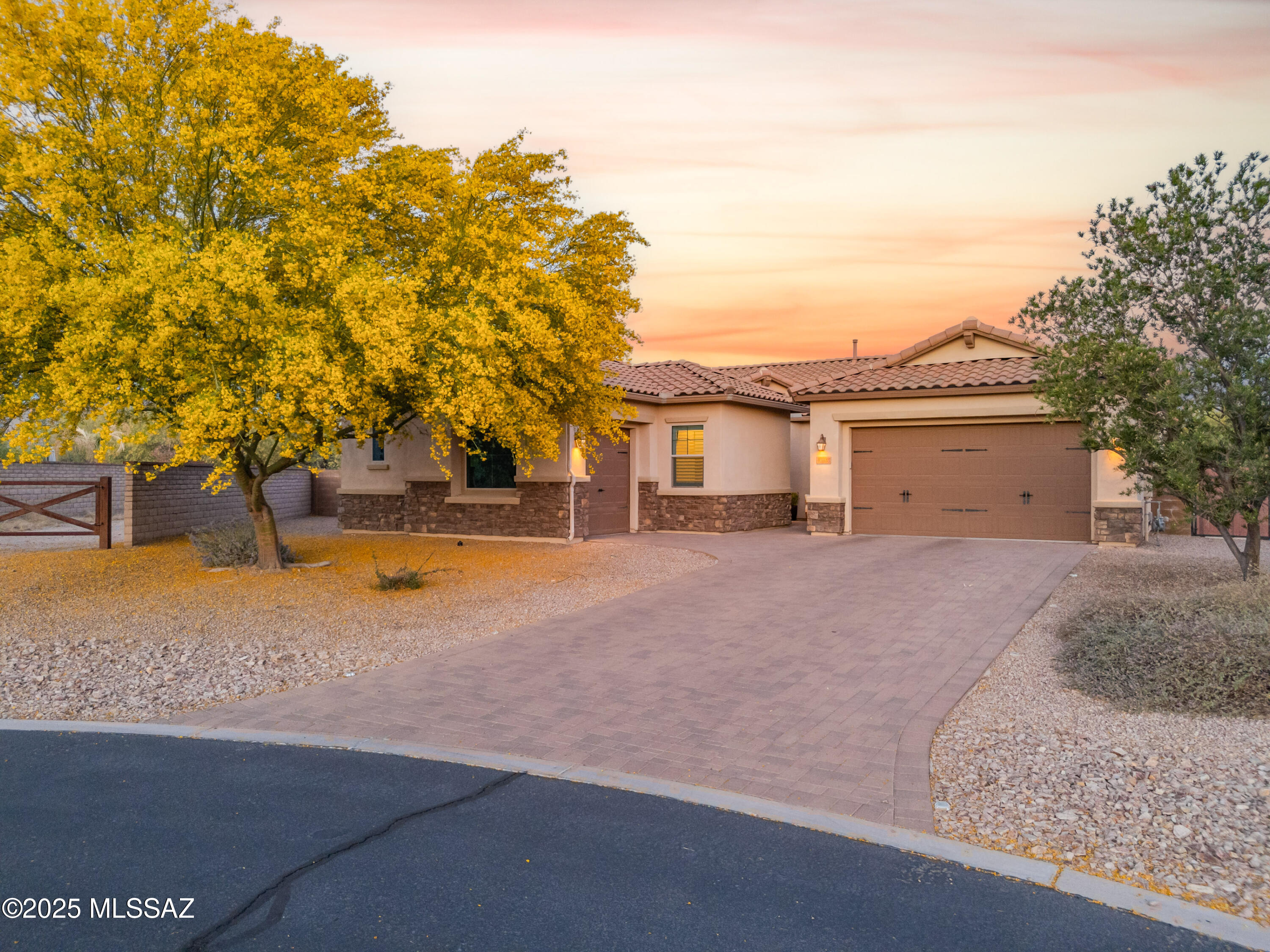 This stunning 2017 Pulte home in Desert Willow Ranch sits on a rare .46-acre lot and has been upgraded to impress! The backyard is an entertainer's dream—sparkling pebble tech pool, 4,500 sqft of turf, a mini basketball court, travertine patio, and more. Inside, enjoy a smart home automation system, water filtration, custom lighting, and a private guest suite. The added mudroom and laundry cabinetry bring function and style. With all the big upgrades already done, all that's left is to move in and enjoy the best of NE Tucson living. Previous buyer contingency fell through! Their loss, your gain!