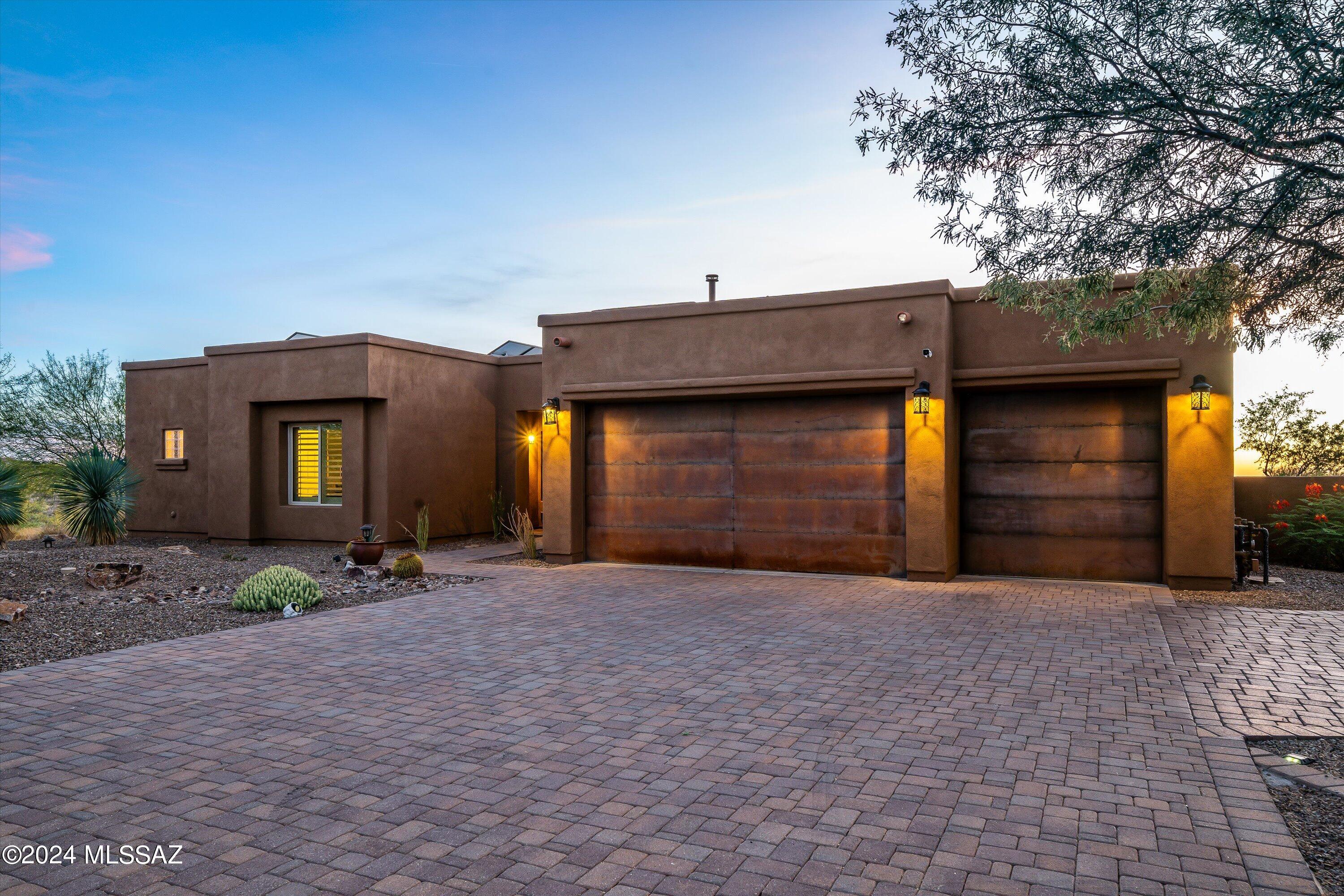 VA Loan is fully assumable at 2.5%!
Welcome to Coyote Creek, a master-planned gated community offering more than just a home-it's a lifestyle!  Nestled in picturesque surroundings with breathtaking views and stunning sunsets, this community features a state-of-the-art recreation center and equestrian center.  This 2700 sq ft residence is elegantly upgraded with a cozy fireplace, plantation shutters, owned solar (30 panels) great layout, amazing views! The home boasts 3 bedrooms, 3 baths, (1 bedroom is an en-suite),  a sparkling pool and spa, a professionally landscaped backyard with artificial turf. In addition, there is a 3-car garage and a detached 2-1/2 car garage/workshop for car enthusiasts!