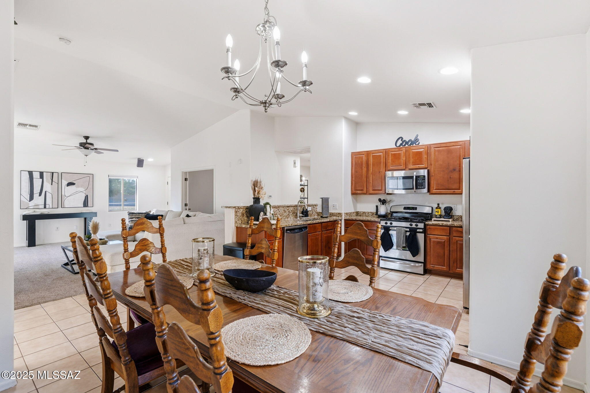 Move right into this wonderfully maintained 4-bedroom, 2-bathroom home in the Madera Highlands community—all for an incredible price! This is your chance to enjoy a fantastic location near the Madera Highlands Park, which offers a community pool, basketball and tennis courts, and a playground. The home itself sits on a private cul-de-sac lot with no neighbor to one side. Inside, you'll love the bright, open floor plan creating excellent flow between the living room, dining area, and kitchen. The kitchen is ready for entertaining, featuring sleek granite countertops and stainless steel appliances. Privacy is key with the split-bedroom floor plan. The spacious primary suite is a true retreat, complete with a double vanity, soaking tub, a separate walk-in shower, and a walk-in closet. The backyard is ready for gatherings, featuring a firepit and decorative gravel, a blank slate for your outdoor oasis. Don't miss this one!