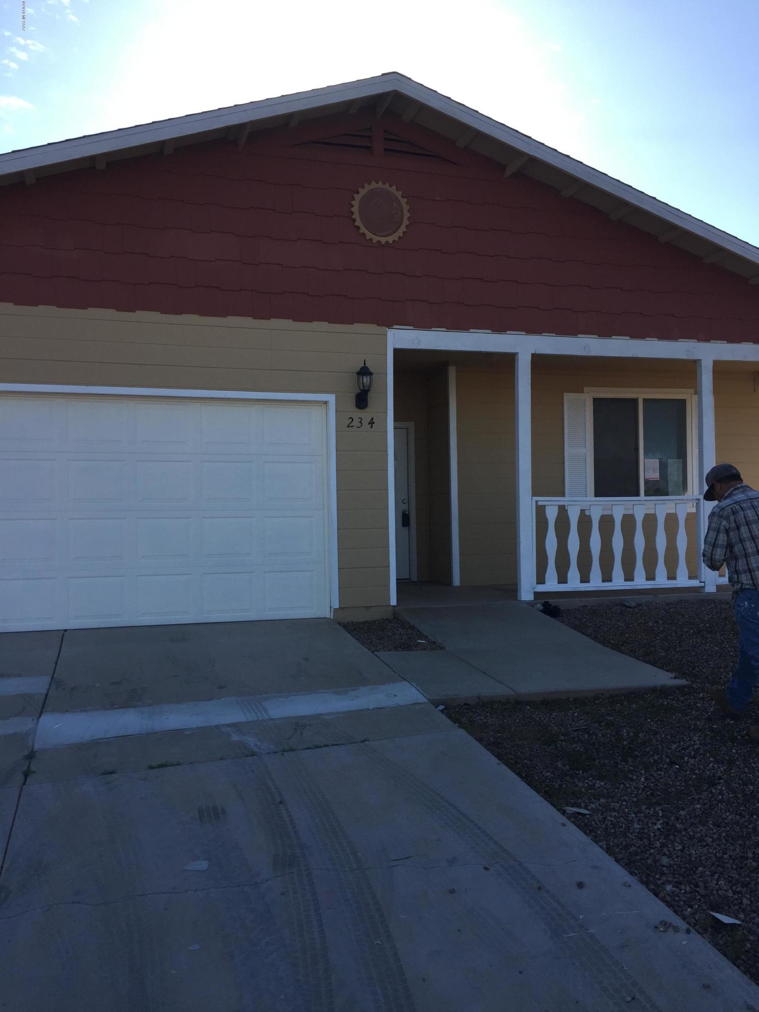 Great location in Benson! Covered porches in front and back,enjoy both morning and evening for entertaining.Open area in front living room with plenty of space.Fresh paint ,looks like new home!Huge back yard with terrific views.Like new 2 car garage!This home will not last!