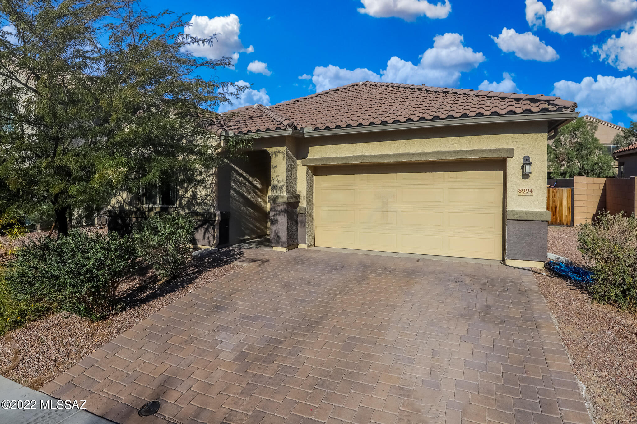 Fabulous location of this Northwest charmer. Lovely welcoming 5 bedroom home with lots of room for everyone! Freshly painted split floor plan with an open great room and vaulted ceilings. A comfortable kitchen sits inside this spacious floor plan with a large living room and dining area. Backyard is perfect for entertaining. Amazing views of Saguaro Studded cliffs and amazing sunsets. (Ask about Carpet Allowance).