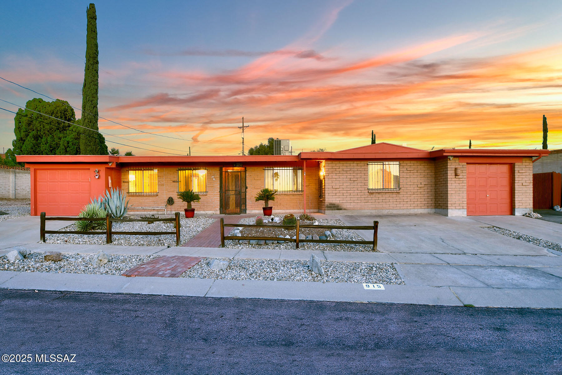 Welcome to this remarkable 3-bedroom, 2-bath family residence, boasting over 2,300 square feet of thoughtfully updates! The spacious great room flows effortlessly into a fully refreshed kitchen, with newer cafe oven, and showcases a charming wood-burning fireplace, perfect for cool desert evenings. A separate family room offers versatile space ideal for gaming, relaxing, or entertaining. Additional highlights include a formal dining room, dedicated office, fitness area, laundry room, and generous storage—all wrapped in the charm of a beautifully updated ranch-style home. , enjoy a multi-tiered yard designed for fun and relaxation, featuring a sparkling Pebble-Tec pool and spa , low-maintenance turf , an expansive covered patio, fruit trees, including citrus and fig, and plenty of open space for outdoor activities. With separate his-and-her garages,  tons of storage space, off street parking, separate work shop. Lovely!