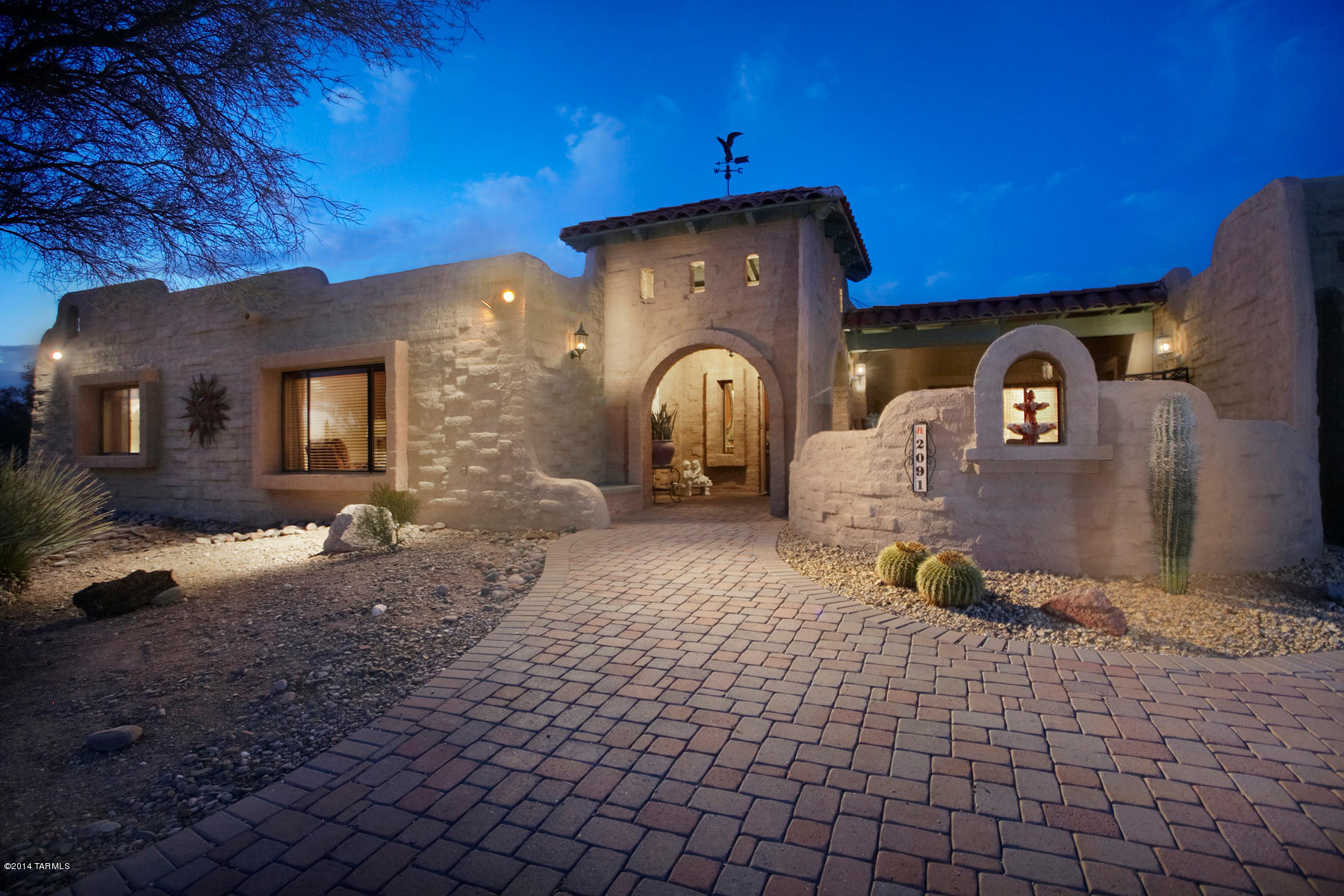 Tucked away in a private cul de sac in the desirable foothills community, Cat 8, is a home that challenges conventional notions of space, provides privacy and  excellent views of the mtns.  Current owners have extensively remodeled and decorated this Spanish style home.  It includes a 3 bdrm, 3 1/2 bathrm main house (3824 sf), attached guest house with 2 bdrms, 2 bathrms (1657 sf), 4 car garage plus separate 2 car garage with 1/2 bath (1846 sf), and a separate enclosed pool & spa rm with a special dehumidifier system that keeps humidity low. Very little chemicals are needed, very pleasant not like the usual indoor pool, pebbletec surface. This home is immaculate and beautifully finished with custom designer touches thru out.  Long drive way and motor court finished in pavers.