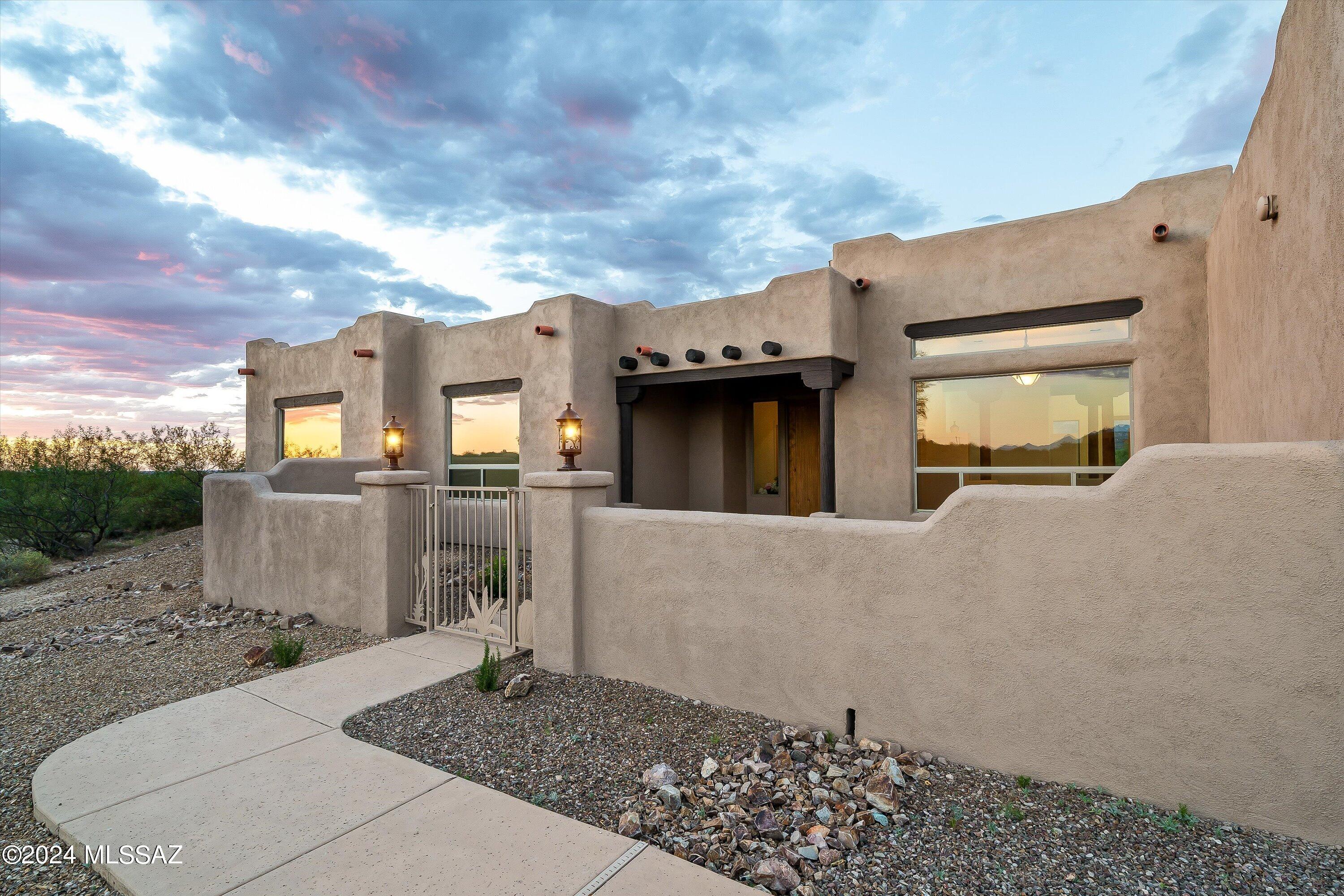 Modern Elegance in Coyote Creek! This stunning home features a Brand-New Driveway, enhancing curb appeal and functionality. Enjoy bright, open-concept living spaces, a gourmet kitchen with new stainless appliances, and a luxurious master suite with a spa-like bath. Step outside to a private oasis with a covered patio and beautifully landscaped yard, perfect space to add your pool, great for entertaining. Nestled in the sought-after Coyote Creek community, you'll have access to miles of hiking, biking, and equestrian trails, plus a recreation and equestrian center. This spectacular home offers a perfect blend of modern convenience and natural beauty.