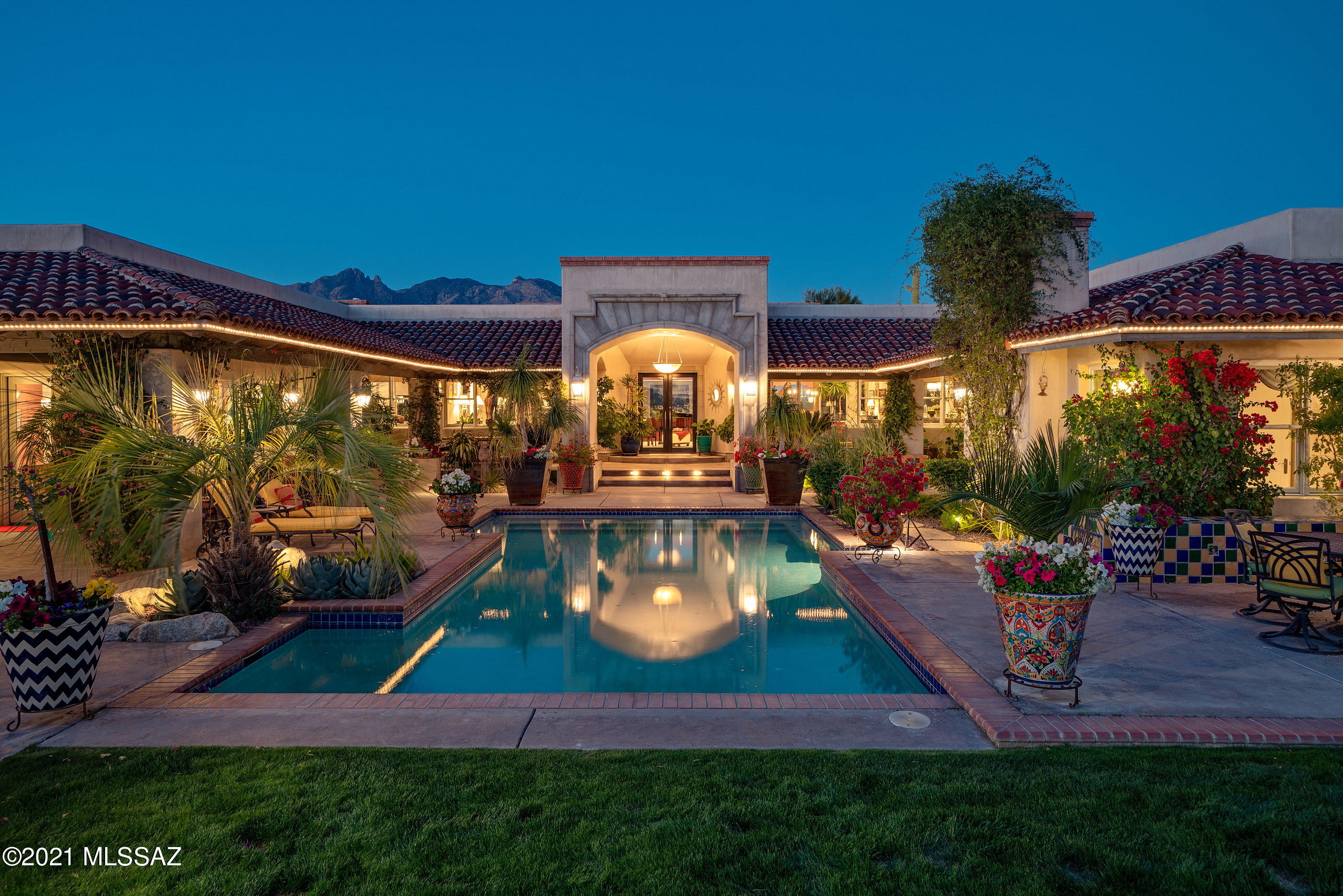 Located in the highly sought after Hacienda Del Sol Estates, situated with lush mature gardens seated behind an enclosed exterior, adding to the feel of this secluded estate. An elongated veranda connects the shared living spaces, with a series of sliding glass doors coordinated to tie the interior rooms to the spacious outdoor living environments, resulting in a juxtaposition of private and social spaces. Layers of elevated and extensive covered patios are perfectly sited to enjoy year round, with views stretching out over the city lights beyond. Native vegetation juxtaposed against the green lush lawns, cause an explosion of color, light and shadow, creating the framework for the pool, acting as the centerpiece of this classic courtyard vernacular. Upon entry, you are greeted by a large foyer with soaring ceiling heights acting as the central hall, flanked by a formal living room on one side and dining, kitchen on the other establishing the main connection point of the home. The private East wing of the residence features the sumptuously appointed owner's suite, with custom dressing closet and a luxuriously finished bath, including a large walk-in shower and private walk-out built in spa.

The floor plan comprises both formal and informal living spaces, equally suited for grand entertaining, as well as quiet moments, with a chef's kitchen that boasts a large eat-in dining area, complete with top-end fit and finish, with every measurement and detail having been carefully considered.

Situated on a private cul-de-sac lot offering a series of patios and exterior living spaces perfectly designed for outdoor entertainment. The SW covered patio offers an incredible outdoor kitchen, complete with bbq station, gas cooktop, oven, sink, endless counter space, double sided fireplace and its own evaporative cooling system, specifically designed for year round enjoyment. 

A succession of courtyards results in varied focal points, unwinding like a garden narrative of texture, light and mood. Every comfort considered and detail meticulously crafted, the result being a home that offers a sense of easiness to enjoy both lifestyle and entertainment.

About the Catalina Foothills:

The area boasts many of the city's most upscale boutiques, restaurants, spas and art galleries, with some of the area's major resorts being located in the Catalina Foothills, including the Hacienda Del Sol, The Westin La Paloma Resort, and Loews Ventana Canyon Resort.

La Encantada, an upscale outdoor shopping mall, features specialty shops and restaurants, such as Crate and Barrel, Tiffany & Co, Apple and AJ's Fine Foods, for all your grocery needs.

The Foothills are also home to Tohono Chul Park (a botanical garden) and the DeGrazia Gallery, built by artist Ted DeGrazia (listed on the National Register of Historic Places), as well as countless world-class hiking trails. If you're looking to experience a mix of tranquility, with activity at the ready, all while taking in Tucson's incredible sunsets washing across the Catalina Mountains, living in The Foothills is surely a place to consider.