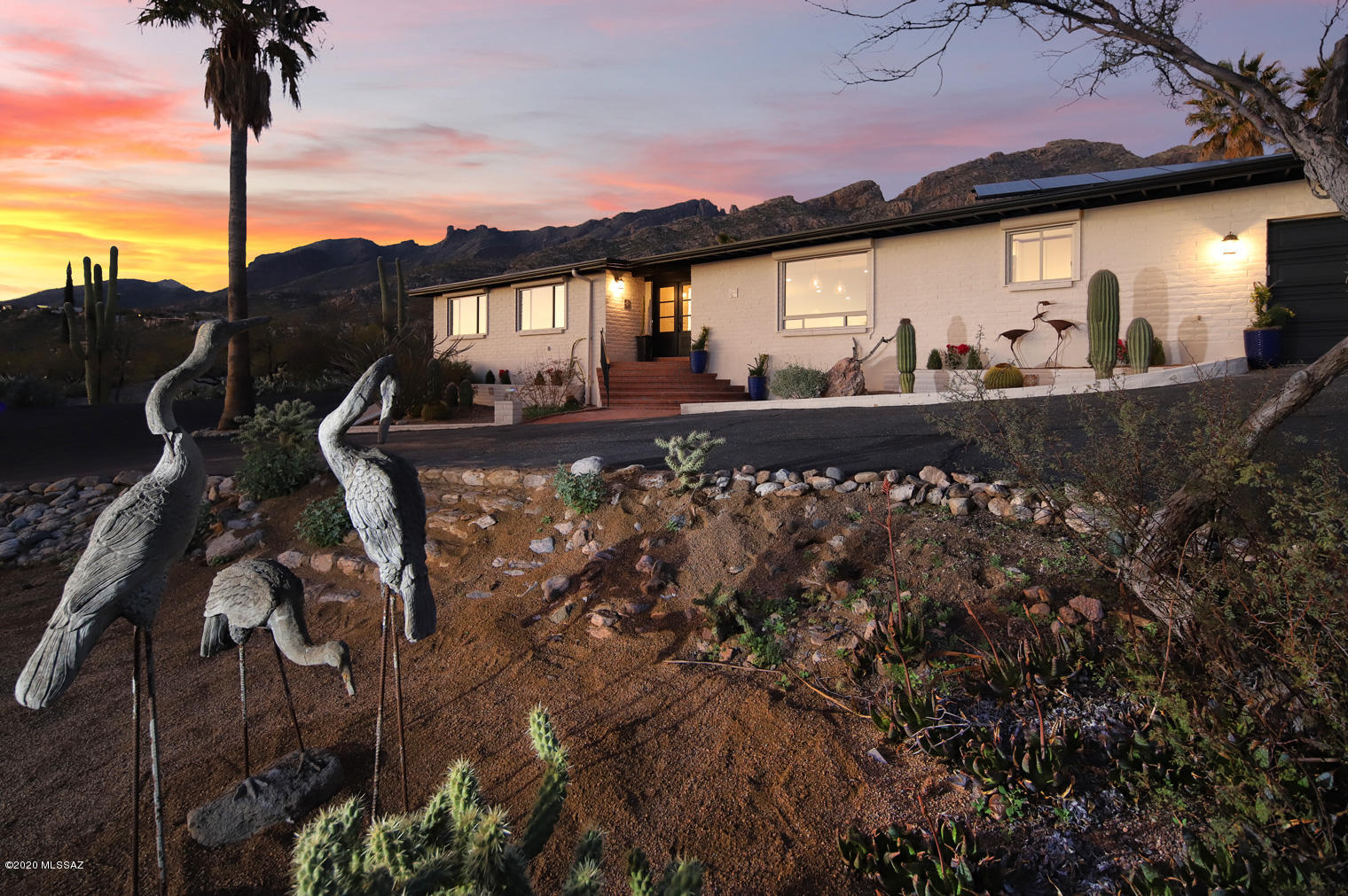 This home has the best views of downtown and the mountains anywhere in Catalina Foothills, flawlessly renovated, locates in the most desirable neighborhood in all of Tucson and minutes from upscale La Encantada shopping. Only the best finishes were carefully selected, masterpiece gourmet chef's kitchen features high-end WOLF appliances, SUB-ZERO fridge, marble countertops, large island with ample seating, walk-in pantry and all new cabinets throughout. 5 bed w/3 bath, split floor plan, and an office. Master bath offers a state-of-art tub and glass walk in shower. Walk outside to multiple outdoor living areas, private serene, oasis hot tub / mini pool. Brand new split high-efficiency HVAC systems. AMAZING HOME!