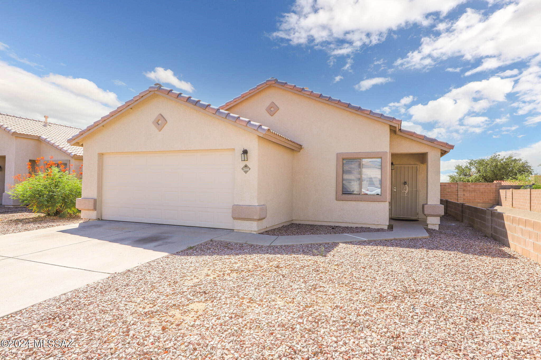 Discover this beautiful 3-bedroom, 2-bath home with a spacious den/office, perfect for remote work or additional living space. Located in a secure gated community, this home features a 2-car garage and is just minutes away from popular shops, dining, and amenities. The open floor plan offers plenty of natural light, and the modern kitchen and living areas provide a welcoming space for relaxing or entertaining. Enjoy the convenience of nearby shopping with the privacy and security of a gated neighborhood—your ideal home awaits!