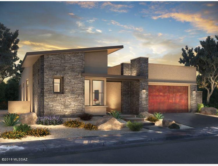 Brand NEW Energy efficient home ready August 2018! The stunning Hogan boasts a large hourmet kitchen and dining area that opens into a spacious great room. Wrap around covered patio with boulder outcroppings in the rear. Two-way fireplace with natural stone included on the interiour from floor to ceiling (optional). Boulder Vista at Stone Canyon is luxury living nestled within rock outcroppings and vistas of the Catalina and Tortolita Mountains. Enjoy peaceful solitude amongst the lush natural Sonoran desert located within prestigious Stone Canyon in Oro Valley. Amenities include golf course and fitness center. Known for their energy-efficient features, our homes help you live a healthier and quieter lifestyle while saving you thousands on your utility bills.