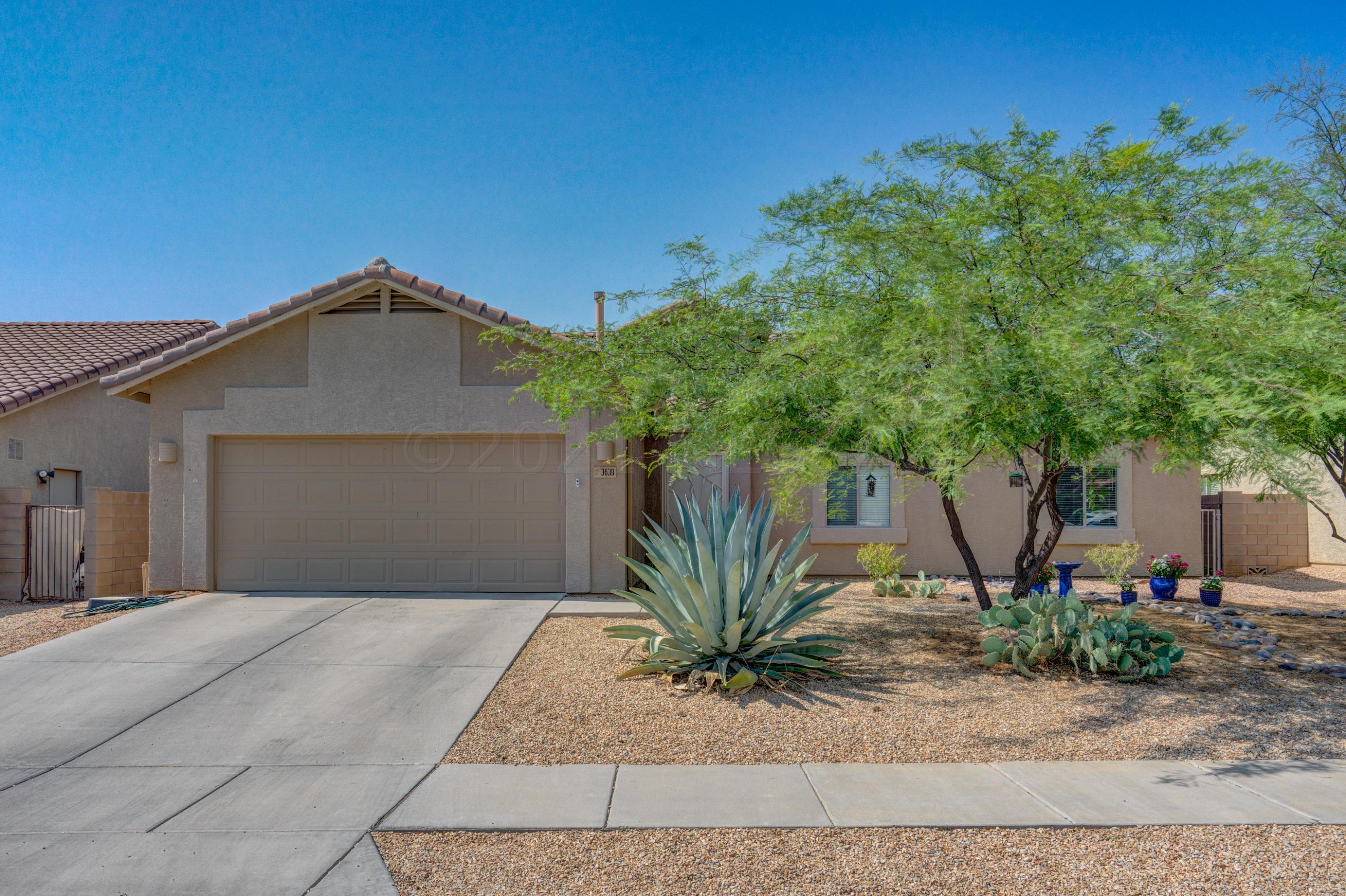 Outstanding 4 BR, 2 BA, 2156 SF move in ready home. Large open kitchen/family room with granite counter tops, hickory cabinets and upgrades, Nearly GE Profile Stainless Appliances. Separate dining room/office. Ceiling fans and custom blinds window treatments. Sparkling Solar heated pool with private rear yard, Artificial grass, recently installed fountain professionally landscaped and is great for entertaining. Large covered rear patio. Extended 2 car garage. Great Family home close to shopping, restaurants and entertainment.