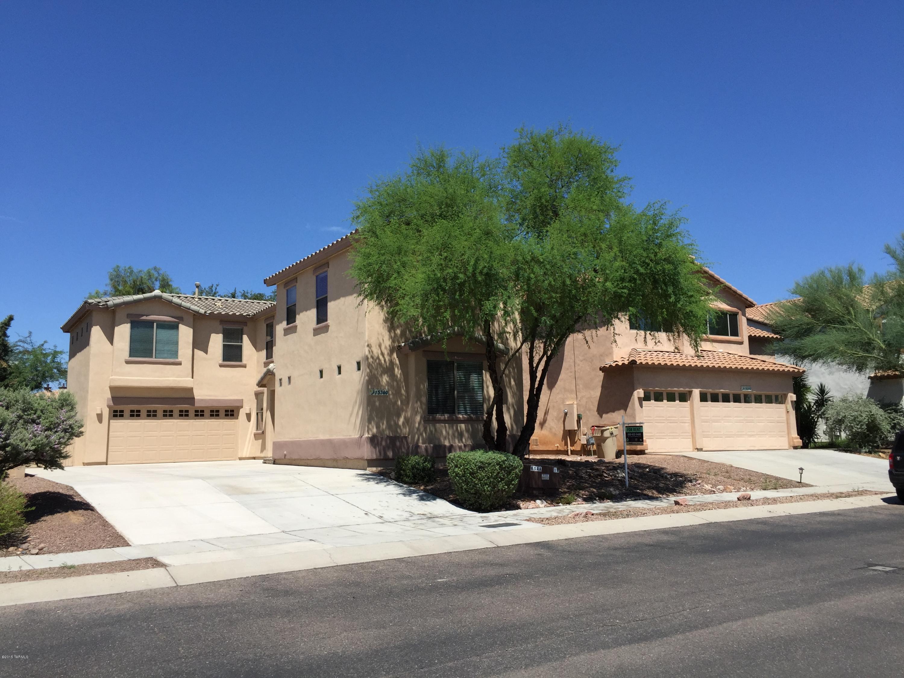 *** $400 OFF FIRST FULL MONTH'S RENT IF MOVE IN BY 11/25*** Spacious 5bd/3bth home located in Rancho Sahuarita gated community. Enjoy life in your backyard while soaking in all the sparkle Sahuarita Lake radiates!  Home features very spacious 2,563 sq ft floor plan, open kitchen with island lots of cabinet space, tons of natural light throughout. Ceramic tile and carpet, walk in closets and ceilings fans in most rooms.  Low maintenance landscaping and an extra large driveway.  Owner covers HOA monthly dues so you and your family can enjoy all Rancho Sahuarita has to offer! PET FRIENDLY with $300 Non-Refundable Pet Fee (breed restrictions apply). No home held for longer than 14 days. All UTILITIES will remain in owner name throughout tenancy.