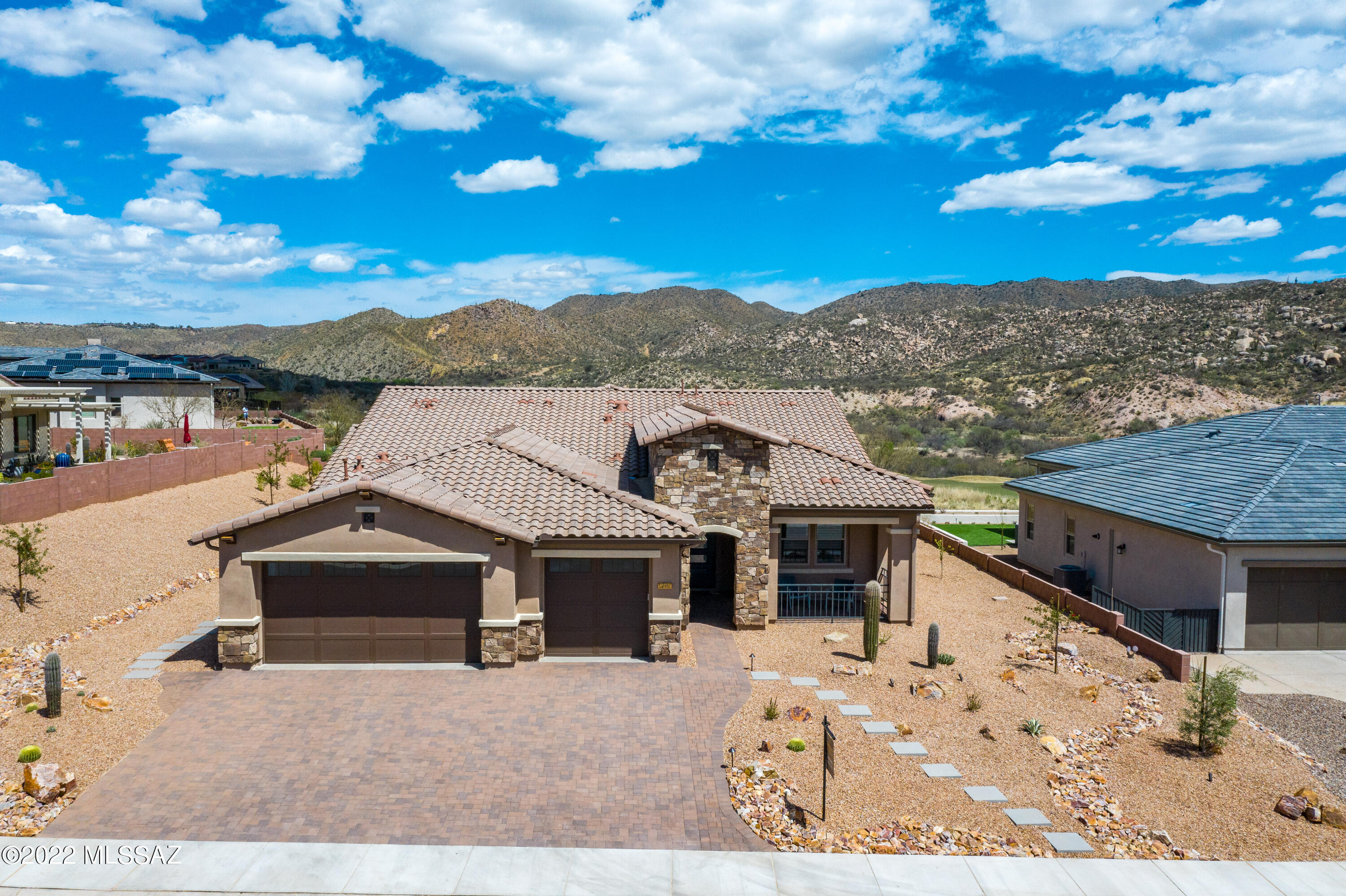 Exquisite Contemporary Avalon in The Preserve @ Saddlebrooke in a Private Setting Backing to Open Space with Catalina Mountain & Golf Course Views. Why Wait to Build? Move Right into this Highly Upgraded Brand New Home with Over $100,000 in New Window Coverings & Furniture. Chef's Kitchen with Quartz Waterfall Counters, Wolf Appliances, Sub-Z, Gas Range Cooktop & Center Island. Butler Pantry with Wine Cooler. Open Great Room with a Wall of Windows Capturing the Mountain Views. Dining Area with a Stacked Stone Wall, Built-in Hutch & Artistic Chandelier. Primary Bedroom with Walk-in Closet & Elegant Bath. Den with Custom Built-ins. Comfortable Guest Room & Full Bath. Resort Quality Outdoor Living Space with Full Length Porch, Extended Paver Patios, Fireplace, Water Feature & Mountain Views.