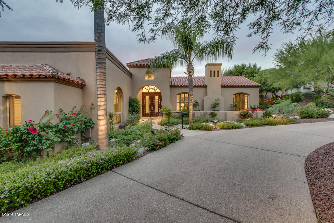 2015 Remodel! Masonry Built-Custom Home in Guard Gated Ventana Canyon w/Mountain & Golf Course Views.Some of the Remodel/Improvements Include:Verona Travertine Tile & Engineered Maple Wood Floors,Kitchen w/All New Jenn-Air SS Appliances & Refaced Cabinetry,Family Room w/New Custom Wood Built-Ins & New Stained Glass Window,Charming Formal Living Room w/Grand Gas Log Fireplace w/New Custom Glass Doors, New Master Bath w/Custom Cabinetry,Granite Counters, & Glass Rain Shower, New Cedar Lined Master Closet,All New Powder Room,New Indoor & Outdoor Rolling Shutters & Blinds,New Alarm System,New LED Lighting Throughout,Oversized 4 Car Garage w/ Epoxied Floors.Exquisite Backyard w/New Lush Landscaping,Stone Work,Fire Pit, and Pool & Spa w/New Pebble-Tec Finish,Tile, Water Feature,and Electronics.