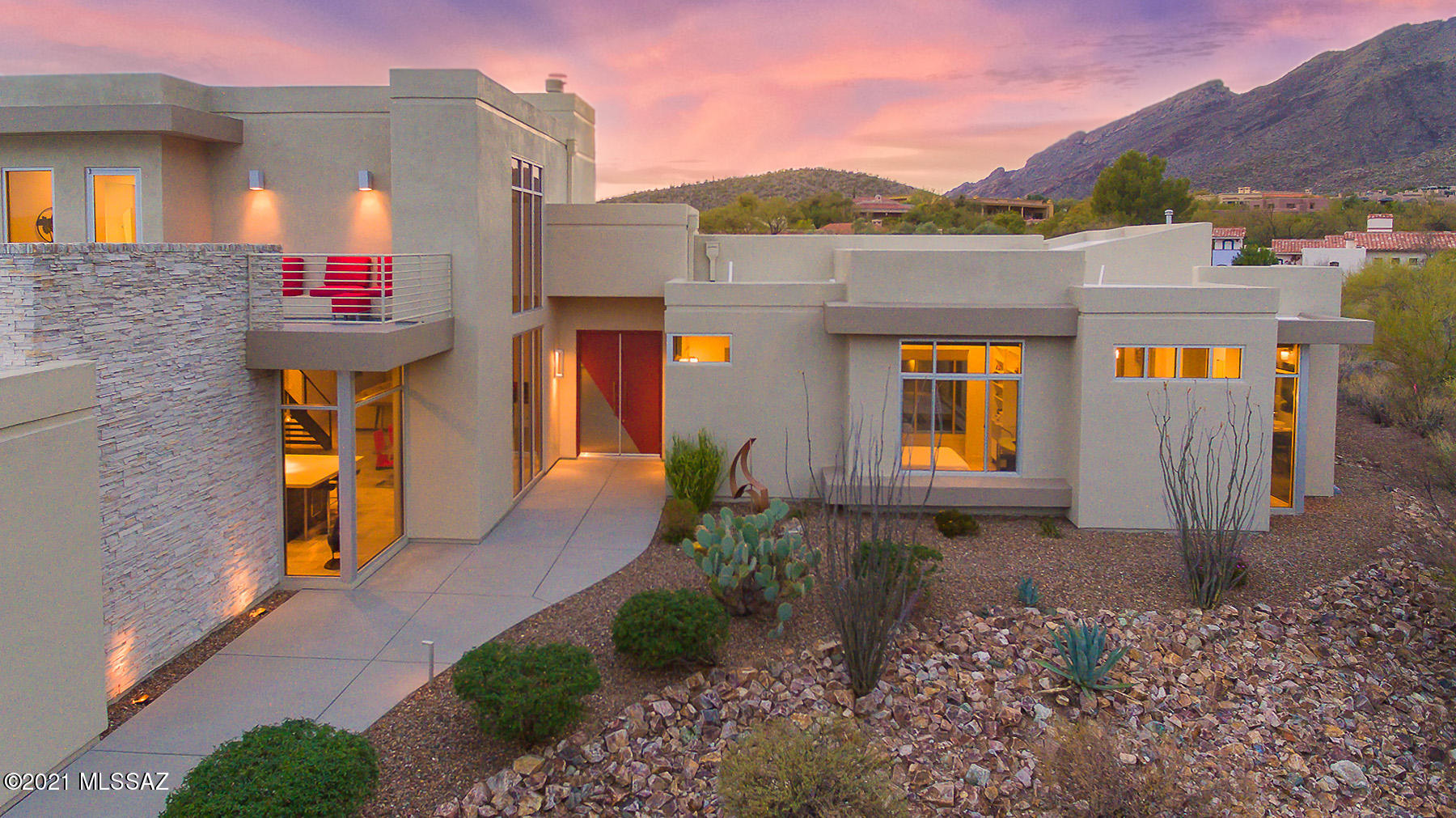 Gorgeous contemporary masterpiece nestled in the heart of The Foothills boasts vaulted ceilings that create an airy open atmosphere throughout the 3,486 square foot home. This 4  bed/5 bath with clean  lines throughout showcases  floor to ceiling windows in main living areas offering abundant  natural light and beautiful panoramic views of the city and mountains from every  room.  Gourmet kitchen includes oversized quartzite island with top of the line SS appliances, ample cabinet space, and 2 wine refrigerators. This split floor plan has a master bedroom with private back patio access, custom cabinetry, and large master bath. The media room upstairs offers a private retreat with multiple look out decks to appreciate the stunning views. Resort-like back yard with salt water pool/spa, BBQ.