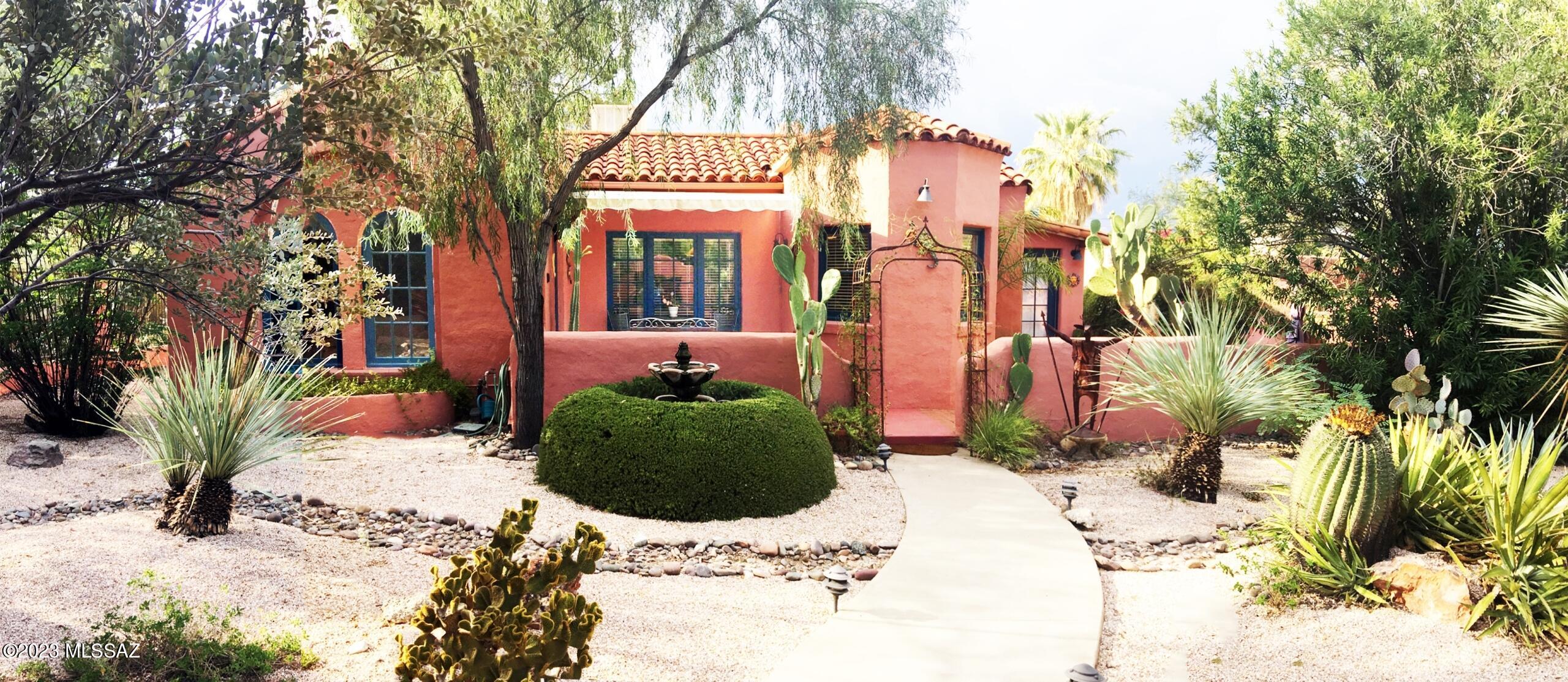 This exceptional 3 unit multi-family Jefferson Park property is very close to the University, situated on two and one-half lots, includes an exquisite 3bd 2ba Spanish style home (circa ~ 1930) as well as a spacious 2bd 2ba guest house with an additional 1bd + apartment, all in excellent condition, with mature vegetation and completely surrounded by a privacy wall. OWNER WILL CARRY.

The Main House – 3 Bedrooms, 2 Bathrooms; 1806 sq ft and a +231 sq ft fully enclosed Arizona room (Rental value +$3,000/mo.)  ia a Tucson classic 3 bedroom / 2 bath Southwest/Spanish style home just blocks from the University and Banner; hardwood floors, coved ceilings, and an Arizona room with a spa; Spacious kitchen with water filtration, dishwasher, garbage disposal, washer and dryer; central AC/heating, wired for a security system, garage/carport; serene courtyard with mature desert vegetation, fountain, electric awning, large backyard with fruit trees, and rear porch; Additional off-street and RV parking; Freshly painted and re-roofed.

The Guest House 2 Bedrooms, 2 Bathrooms; 1189 sq ft + laundry/storage rm (Rental value +$2,000/mo) is a serene, light, airy, secure and private 1960's cottage with a new roof, concrete floors, a large kitchen with ample counter space and storage, water filtration, a dishwasher, GD and great closet space. Private yard with a large covered patio and storage room with a washer/dryer.

The Apartment  1 bedroom, 1 bath 698 sq ft  (Rental Value +$1,000/mo.) is a unique, secure and quiet 1 bedroom, 1 bath, plus office with exposed brick walls, A/C, tile floors, washer/dryer access, private patio, off street parking and more.