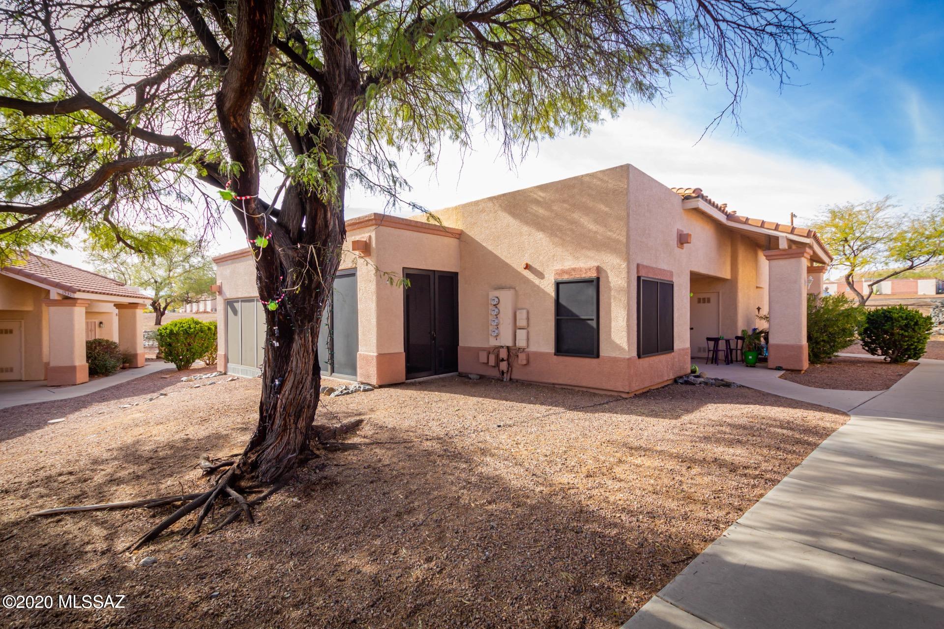 Bright & cheery Townhouse in the desirable Community of Valle Verde.  Custom palette throughout, beautiful  wood ''look'' tile floors throughout the entire house, ceiling fans, & open floor plan. Stylish kitchen counters & plenty of bisque cabinetry w/hardware. Access to the AZ room from the dining area with crime guard windows and upgraded lighting. Roof REDONE AND NEW AC! Perfect for outdoor entertaining.  Generous size bedroom, ample closets, interior laundry closet, & 1 bath. Community Pool & Spa. Will not last!