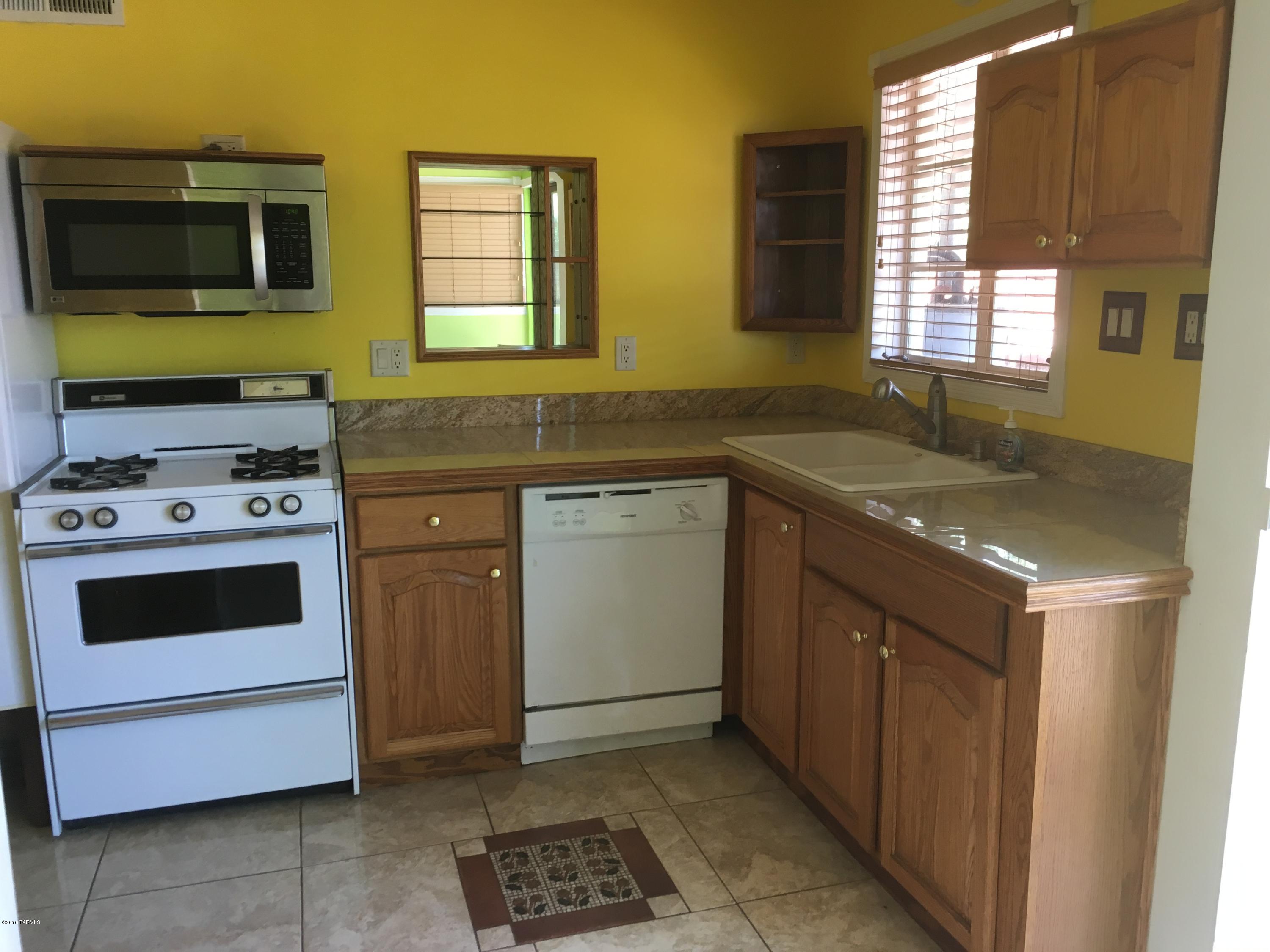 Fantastic 2 bedroom bungalow in central Tucson, with a great outdoor living area.  All appliances included including washer and dryer.  Tile though out. Very convenient to everything including Reid Park.