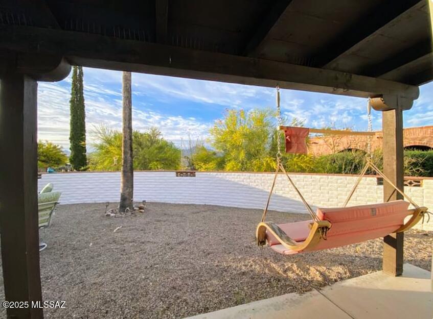 Seller willing to contribute 1% of sales price towards buyer interest rate buy-down and/or buyers closing costs at closing with an acceptable offer. Welcome to your peaceful desert retreat in the heart of Green Valley! This beautifully maintained 2-bedroom, 2-bath home with a den offers timeless character, comfortable living, and thoughtful spaces designed for relaxation and entertaining. Enjoy the convenience of an indoor laundry room, a spacious garage with extra storage, and versatile additional areas perfect for a formal dining room and bonus space—ideal for a home office, hobby room, or cozy den. Tucked into a quiet and friendly neighborhood with generous space between neighbors, this home provides privacy and tranquility.