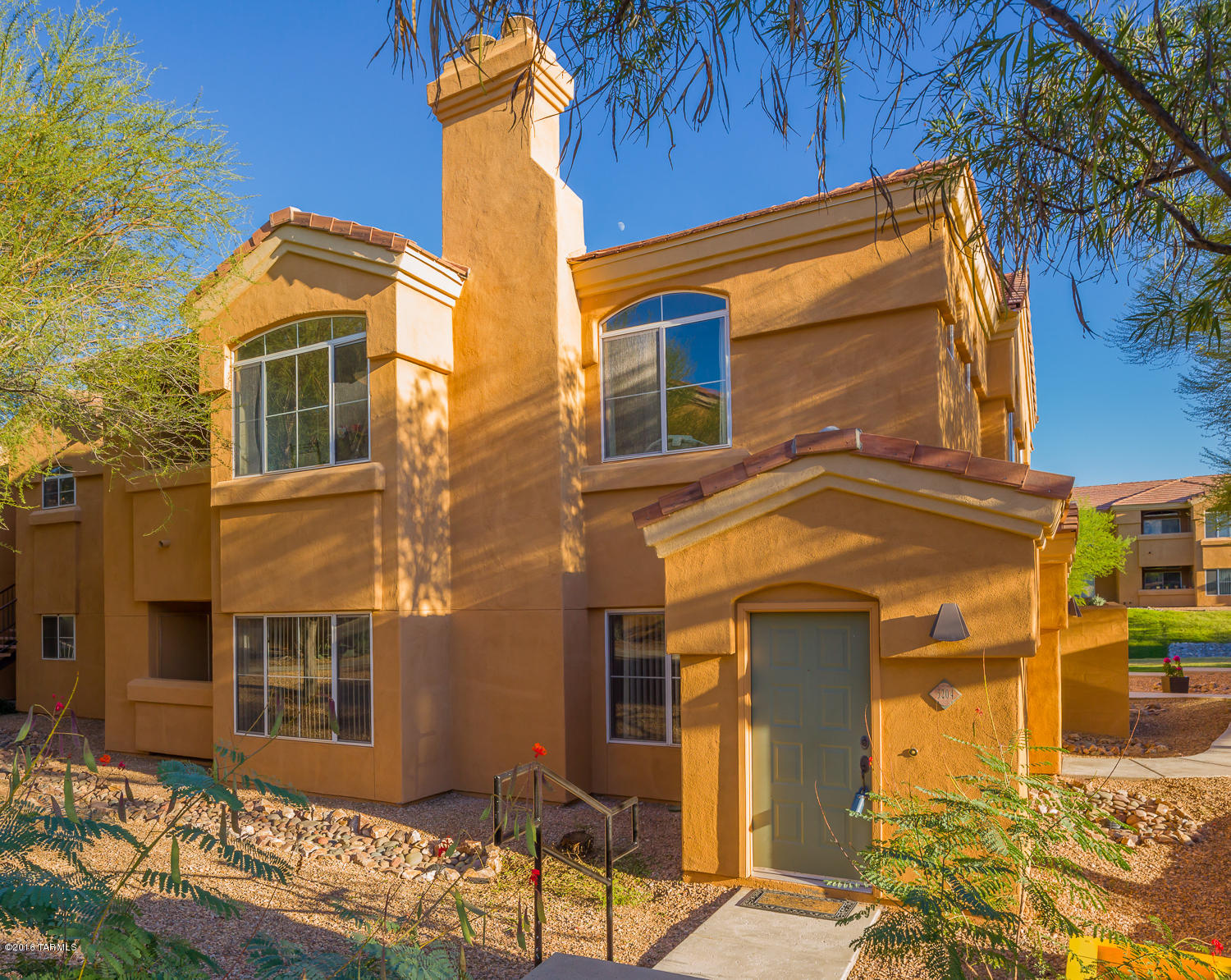 Beautiful 2 Bedroom 2 Full bath, upstairs end unit condo. Experience breathtaking Catalina Mountain views from every window. Open floor plan with split bedrooms and spacious living room/dining room combination. Spacious inside laundry. Newly furnished 1,048 sq ft that is located in a gated-community with resort style living. Great social area with fire place, modern gym, pool, Jacuzzi and a gazebo to enjoy. Walk-ability to shopping and restaurants (Gavi's, El Charro, Commonor & Co). One covered parking #228 space and one open space. Just around the corner from the world famous Sabino Canyon and Ventana Canyon (golf)!Furniture also available with appropriate offer. Google Pinnacle Canyon Condominiums for more info, CCRS, etc. Move in Ready