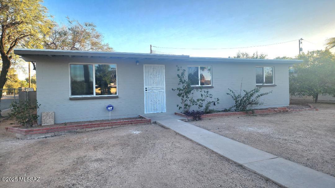 Wow--this home has been completely remodeled from top to bottom! Sitting on a large corner lot in a peaceful cul-de-sac, it offers plenty of space and privacy inside and out. You'll love the open, updated floor plan and the easy-care outdoor areas--perfect for relaxing or working on projects. There's even a rolling gate that leads to a detached carport, plus an attached workshop and storage room for all your tools and hobbies. With Tucson Mall, great restaurants, shopping, and freeway access just minutes away, this home truly has it all! oh, there are no HOA fees or dues.