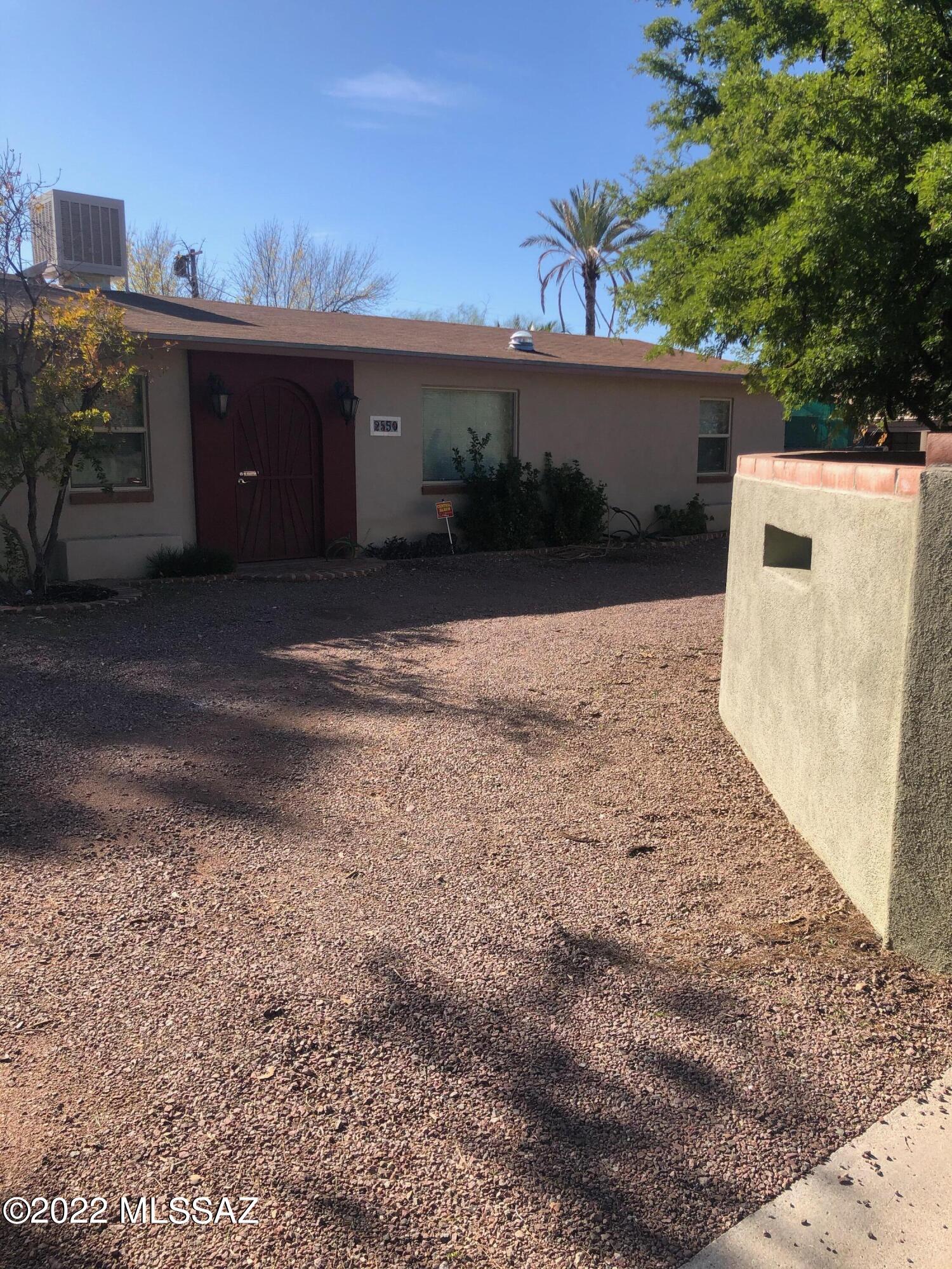 Central Tucson Home in Blenman Elm Historical area. 4 Bedrooms 2 Baths Large Living Room, Family Room off Kitchen with sitting area.  Walk in Master Shower.  Hall Bath Shower/Tub combo. Nice spacious yard with small entertainment area. Central AC & Heat. Concrete Flooring and ceramic tile thru out.  All Kitchen appliances included as well as Washer & Dryer!  Extra Long driveway with carport.  Circular front driveway.  Walled rear yard. Home affords both privacy and location convenience to Central areas!  Great Location. Pet with prior owner approval.