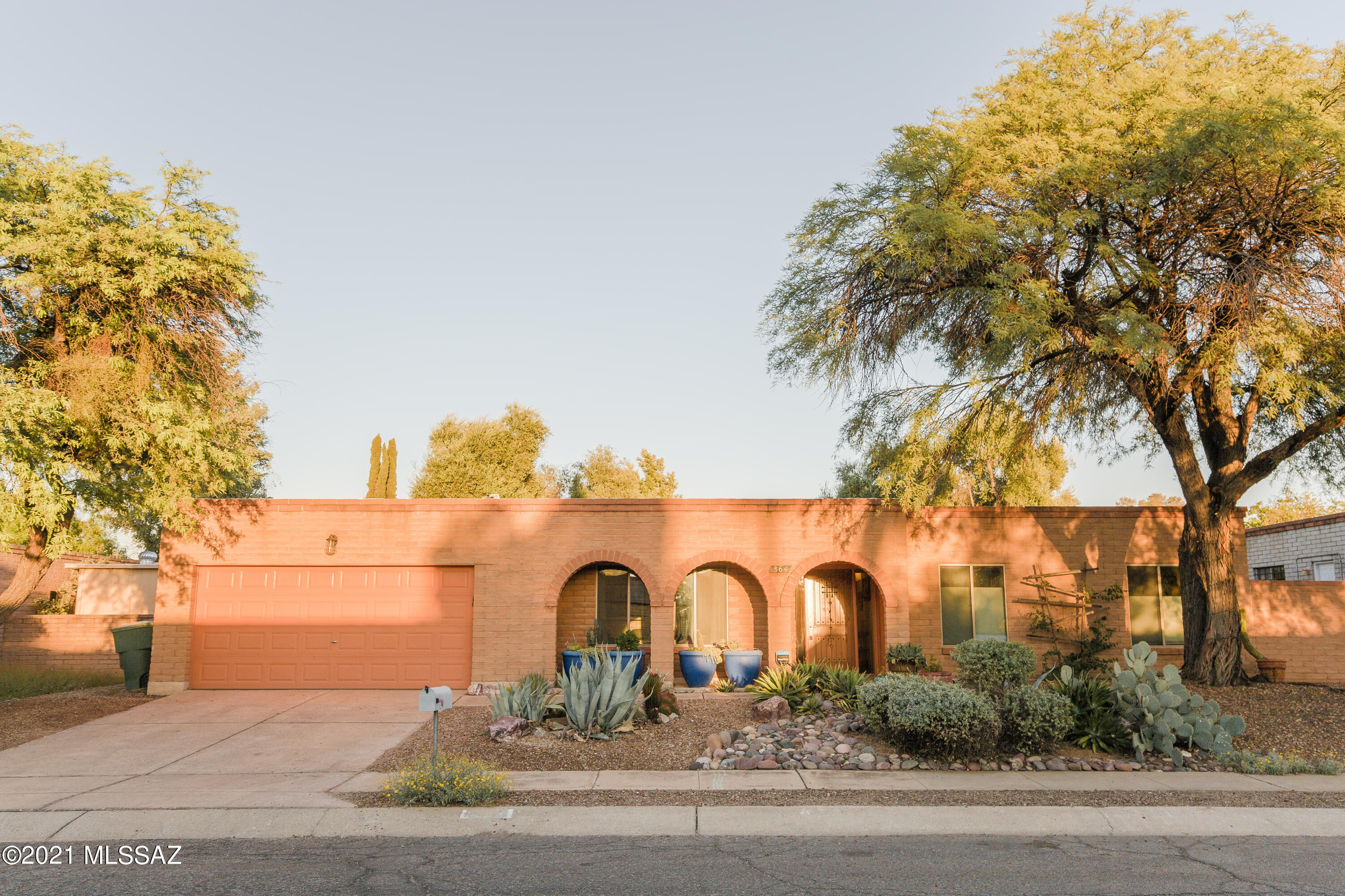 Classic Tucson-vibes in this 4 bed/2.5 bath east-side home with all the room you need for your family, your pets & your guests! Tastefully updated throughout & meticulously cared for- no space has been untouched. Skylights contribute to a light & bright ambiance that is characteristic of the highly-coveted 1970's Tucson homes. There are so many spots in this Charmer to sit w/a book or curl up for a nap. Even a spot for your pool table, if needed! The family room has a wall of windows & two French doors, perfect for game-day gatherings, Christmas mornings & everything in-between. The kitchen is complete w/ stainless steel appliances, a double-oven & granite counters. Unlike most brick homes, this place has tons of storage, including built-in shelving in the pantry room and in the garage. The backyard is private & spacious with no rear neighbors, mountain views & the cutest custom built-in treehouse you ever did see! A dog run is ready for your furry friends or reinvent the space for your home garden, storage for your outdoor toys or whatever your heart desires (NO HOA).  Wonderful locale- close to shopping, restaurants, bike paths & more. Make this MCM-vibe home yours today and enjoy it for years to come!