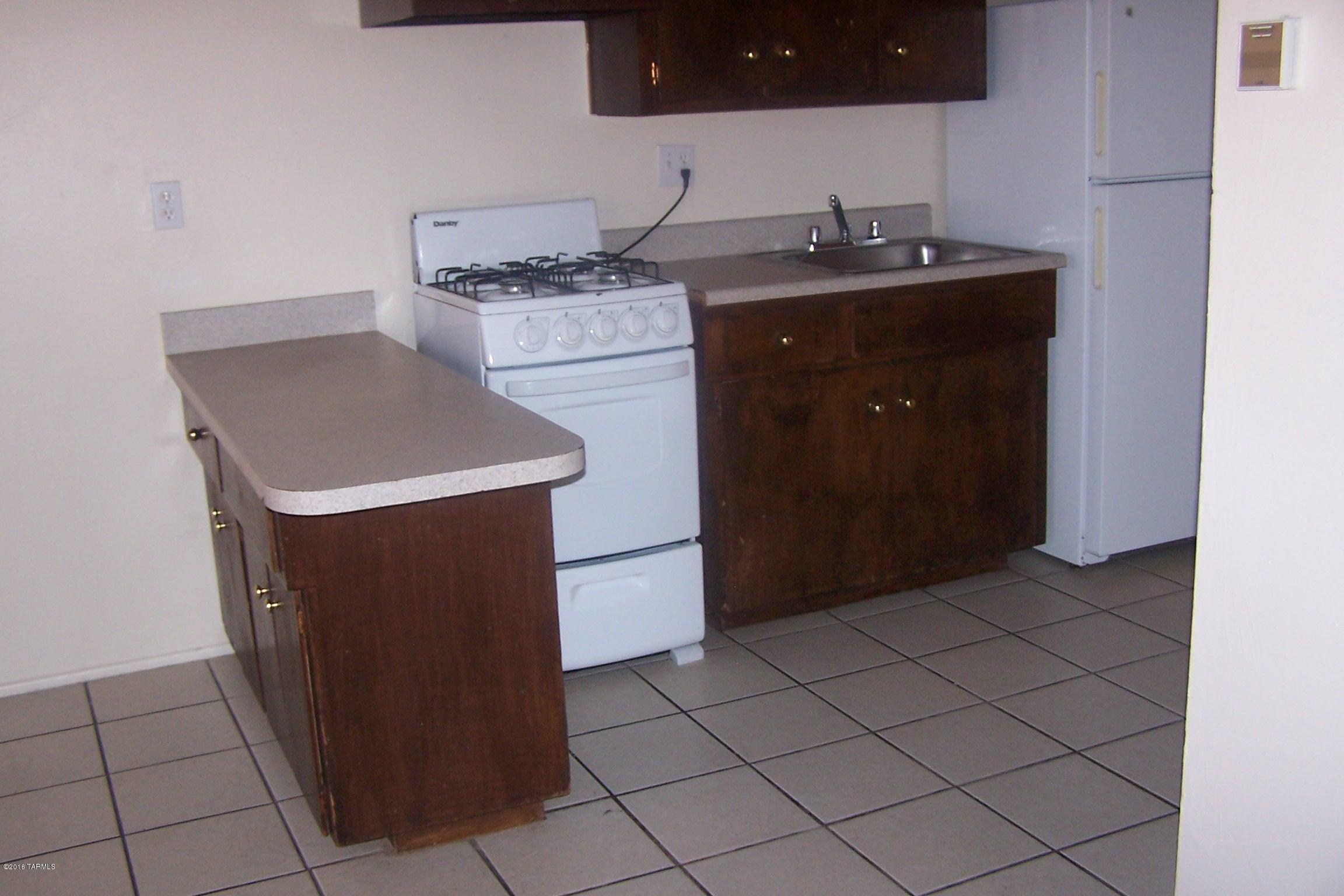 Property consists of 24 total units: 2 apartment buildings and 3 single family residences.  All built between 1952 and 2002 on four tax parcels, all must be sold together.  Request package for details.