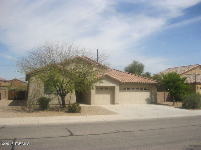 Must see! Amazing one story executive home with 3 car garage, 4 Bedrooms, 2 baths plus den/family room. Kitchen features stainless steel appliances including side-by-side refrigerator. Tile flooring in kitchen, breakfast area, laundry, den and baths. Split bedroom plan. Large master with door to the patio. Master bath has two sinks, separate shower and garden tub, plus large walk-in closet. Ceiling fans throughout. Large covered patio. Separate laundry room. Water for exterior/landscaping included. Backs to common area/park like setting behind. Enjoy all that Gladden Farms has to offer including parks and walking paths throughout. 1 year minimum lease. Non smoking home. $45 application fee per adult. Subject to credit approval. Renters insurance required.