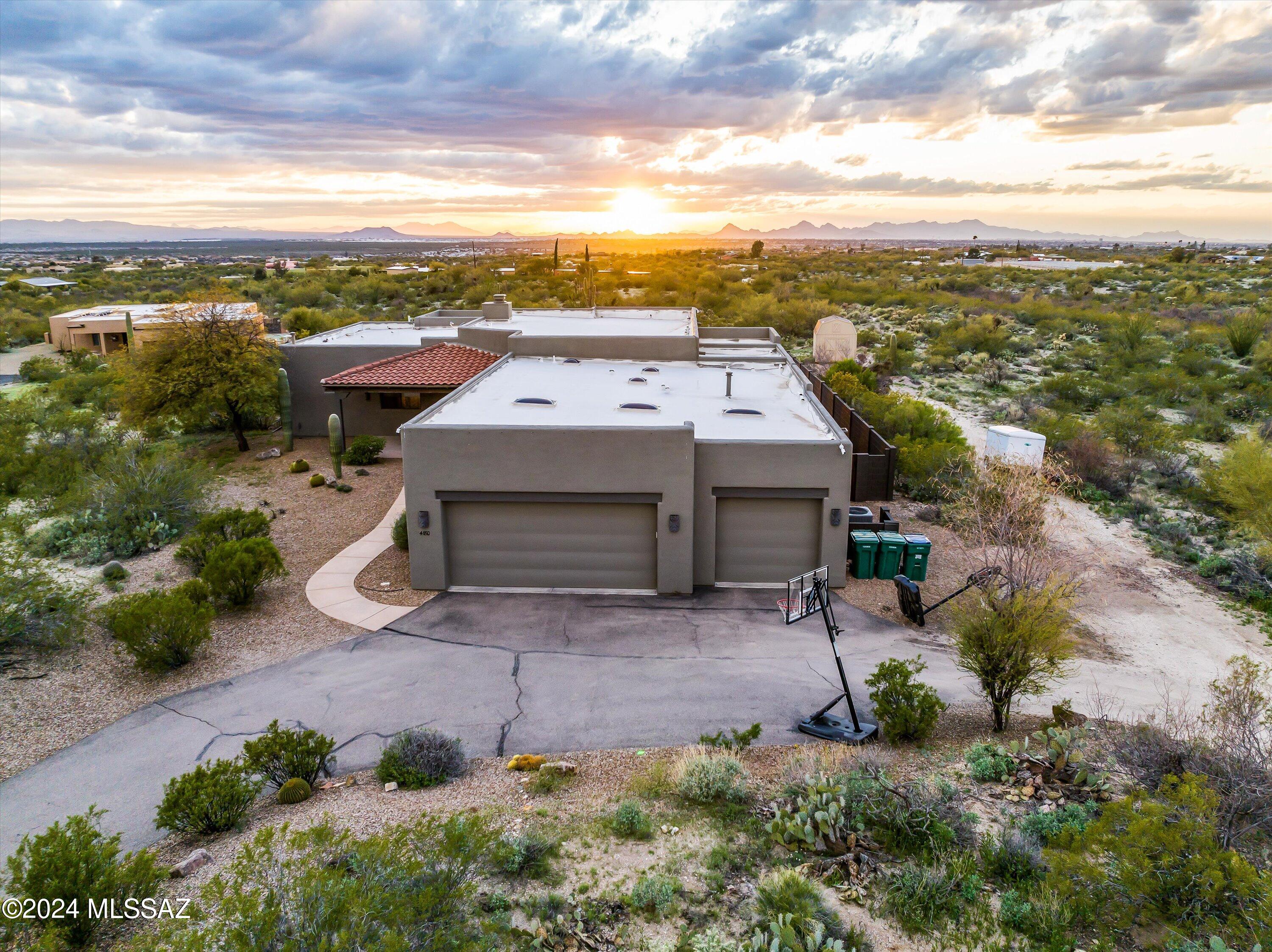 REDUCED! Seller will accept/counter offers between $800k-$825k. Amazing custom built home on elevated lot in desirable Old Spanish Trail area. Bright and spacious split bedroom floor plan with 4 bedrooms + den/3.5 bathrooms. Great room concept with spacious kitchen with huge island, breakfast bar, double ovens, and built in microwave. Custom touches including soft corner, niches, and solid alder doors. French door entry Huge primary suite with bonus office/den. Beautiful primary bath with separate vanities, soaking tub, separate shower, and massive walk in closet. Huge covered patio over looking sparkling pool/waterfall feature with unobstructed views of the city and mountains. Peace and tranquility abounds with this desirable 3.3 acre lot. Must see!