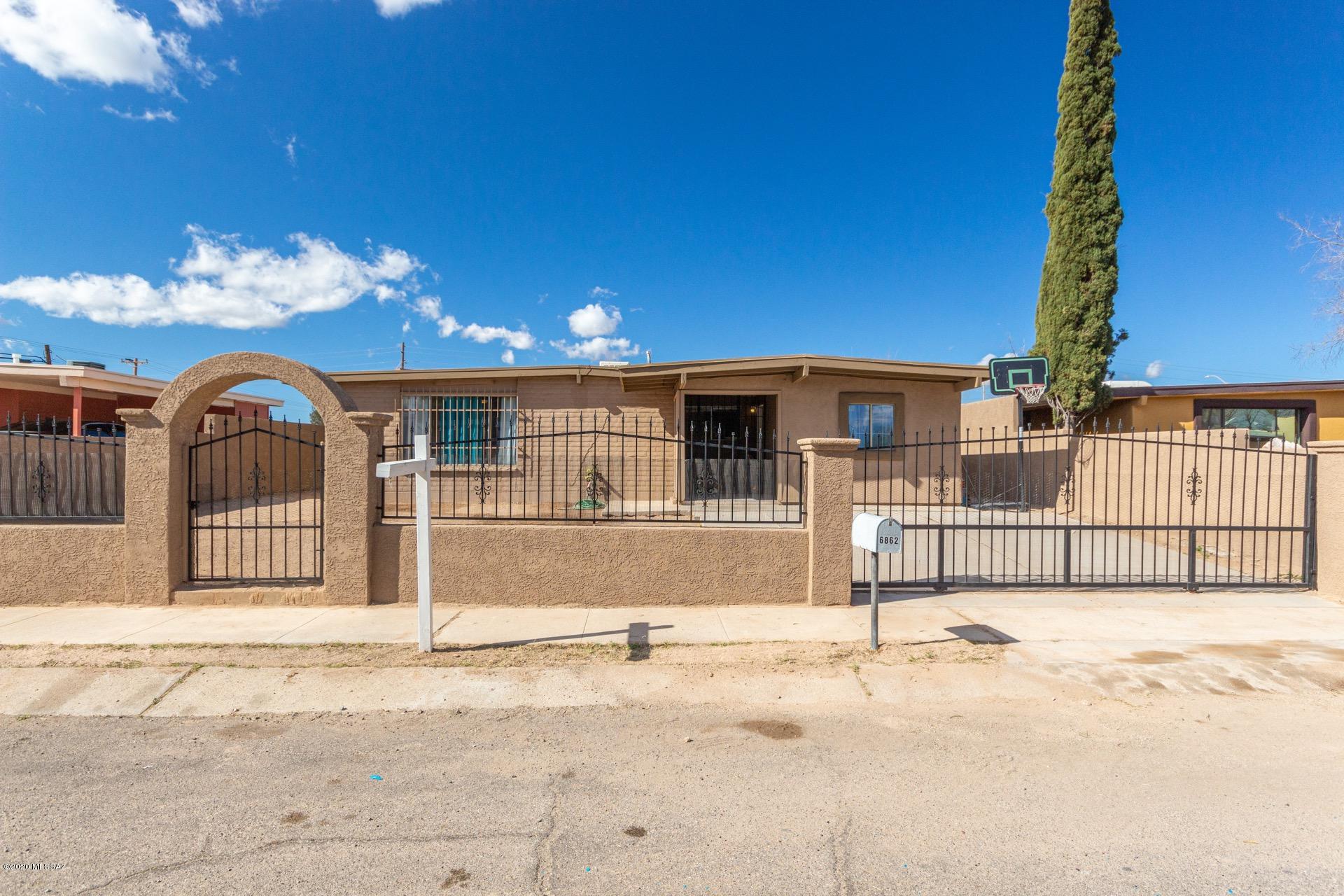 Very charming 4 bed/2 bath home available in south Tucson. Excellent location, nestled just off of Valencia Rd, within easy reach of the I-19, close to shopping and restaurants and walking distance to schools. Inside is bright and inviting. Neutral paint tones and soft natural light throughout. Spacious living area and eat-in kitchen with plenty of counter and cabinet space and coordinating black appliances. Low maintenance tile flooring almost everywhere in the home. Master bedroom with private en-suite. There is also a bonus room, perfect for crafting, media or games. Large backyard awaits your personal touch. This gem is- offered at an incredible value and will sell fast. Call to schedule your showing today.