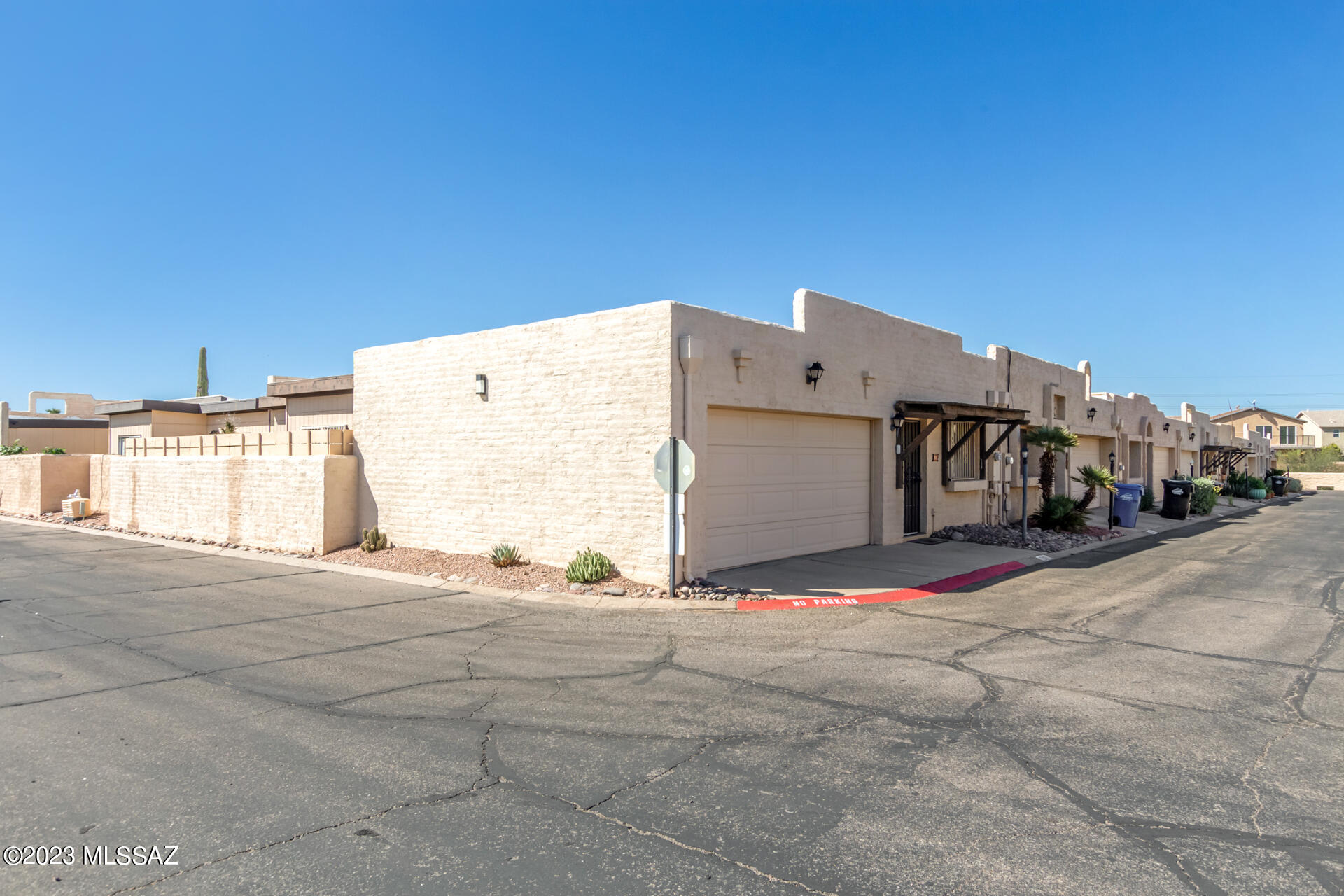 The search is finally over! This charming 2-bedroom townhome in Pueblo Villas is the one you're looking for! Upon entering, you'll immediately notice the large living room featuring vaulted ceilings that amplify the sense of space and light, creating a serene environment to relax or entertain. The kitchen displays modern stainless steel appliances, espresso cabinetry, solid surface counters, subway tile backsplash, a 2-tiered breakfast bar, and a bright dining area with sliding glass leading to the back patio. Discover the sizable primary bedroom providing a walk-in closet and a private bathroom with an enclosed-glass shower. Outside, the cozy paver patio stands ready for alfresco dining. Seize the opportunity while it's still available!