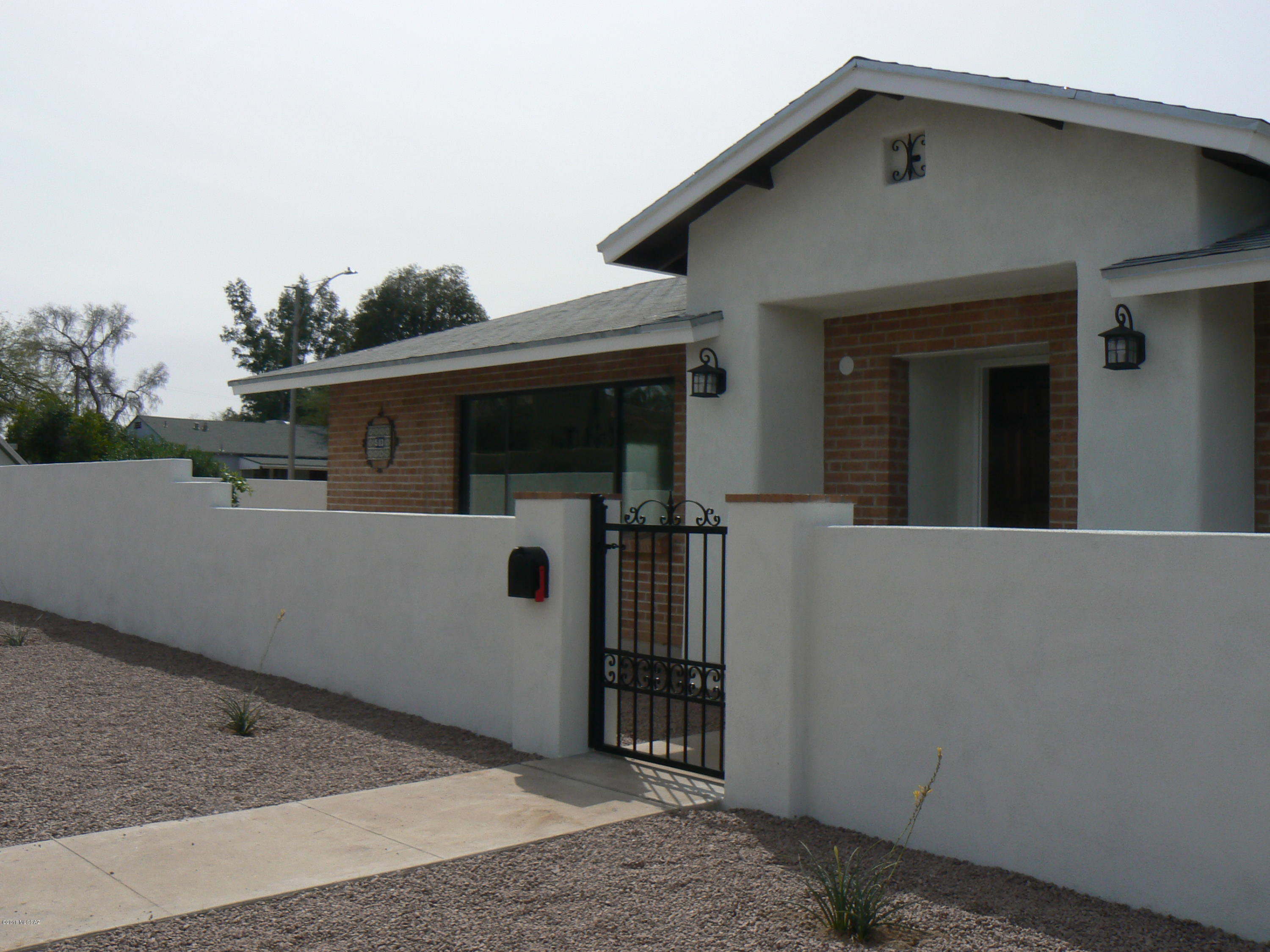 Get the first look at a well appointed remodel in the Sam Hughes neighborhood. With a redesigned inviting front entrance, this 3 bedroom, 2.5 bath home with ample closet and storage spaces awaits the discerning buyer. Walls have been removed and plank tile flooring added to facilitate the open floor concept.  The kitchen was reoriented to create a state of the art cooking experience.  All the doors, windows and slider were replaced and a new french door was added for easy access to the outside area. Bathrms were all updated with new tile, cabinets.  The new landscaping with citrus trees on a drip system has been tastefully walled to give you a private patio garden waiting for your personal touches. A full two car garage(22x32) with new door openers has plenty of room for storage.