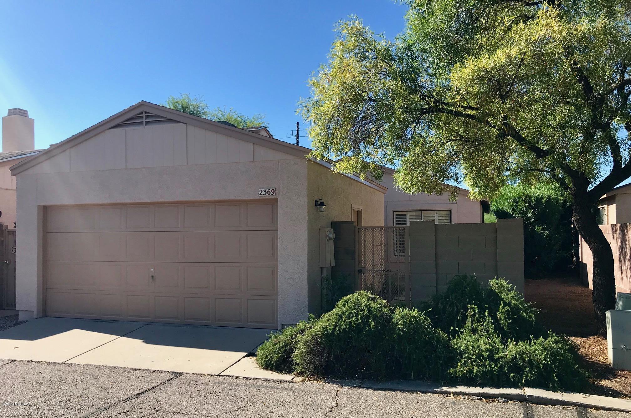 Gated entry Ironwood Ridge Patio home only minutes to downtown or the northwest side of town, U of A, Pima College and or  hiking trails! All Poly removed over the last couple years, just installed new Tile,new carpeting and freshly painted inside and out! features all plantation shutters, all appliances (in as is condition) stay. Spacious 2 bedroom 2 bathroom with private front and back courtyard. Master has covered,private patio with mountain views! Light and Bright floor plan with vaulted ceilings, (no POPCORN!)  formal dining room and eat in kitchen, tons of storage and cabinetry. Immaculately cared for in Gated community with pool! Plus 2 car garage!  Even comes with a 5 year termite warranty and a home protection plan.  Fabulous opportunity!