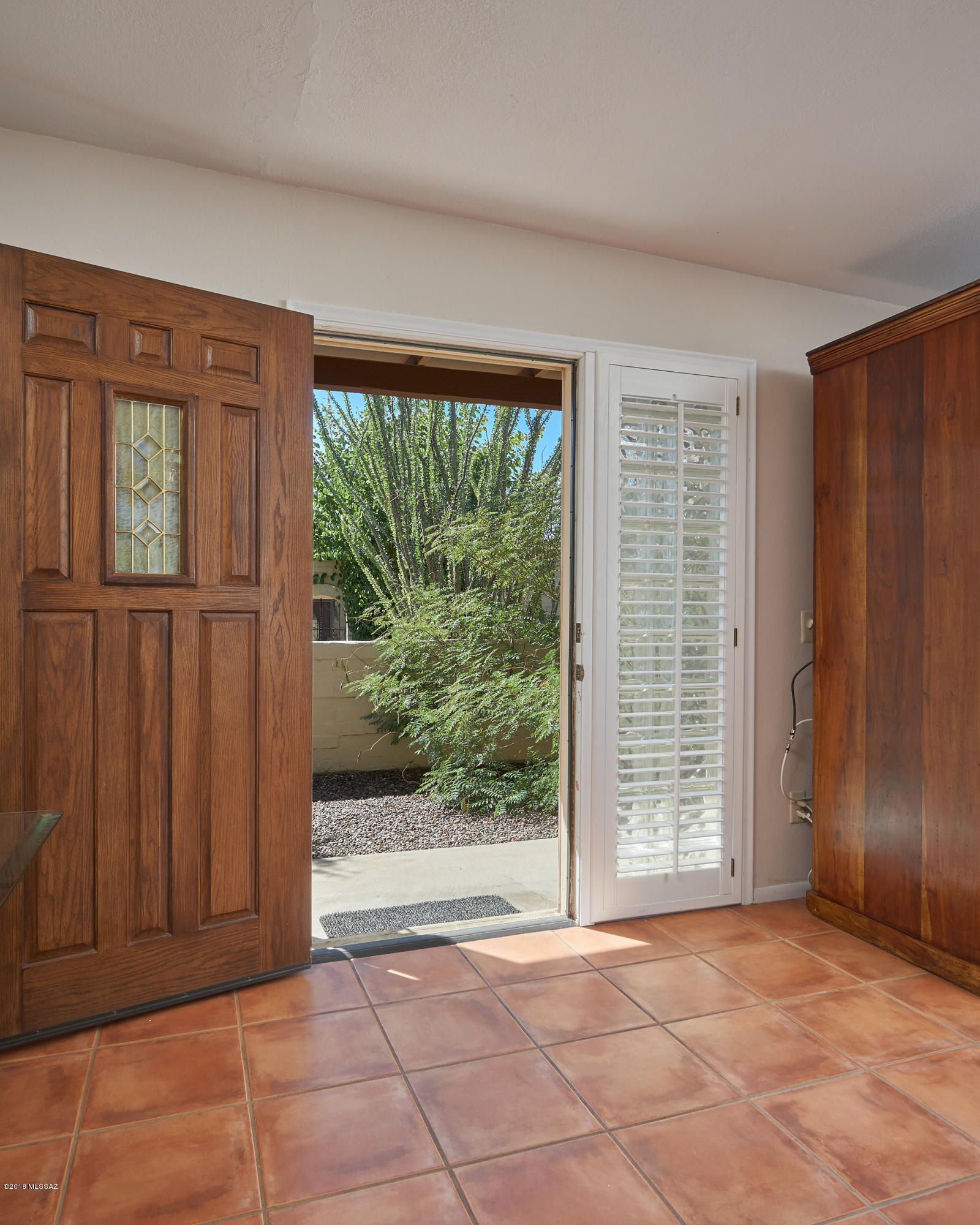 Charming 2 bedroom, 2 bathroom town home in desirable Pueblo Villas conveniently located near walking trails, shopping, restaurants, and more. Enjoy the benefits of a hypo allergenic HVAC installed in 2017. For your convenience, if you choose, you are able to purchase the remaining furniture on a separate bill of sale to make this an easy home to move into. Close proximity to the clean and welcoming community pool and clubhouse. Great for full time or part time. Easy lock and leave home. Please note, rentals are not allowed.