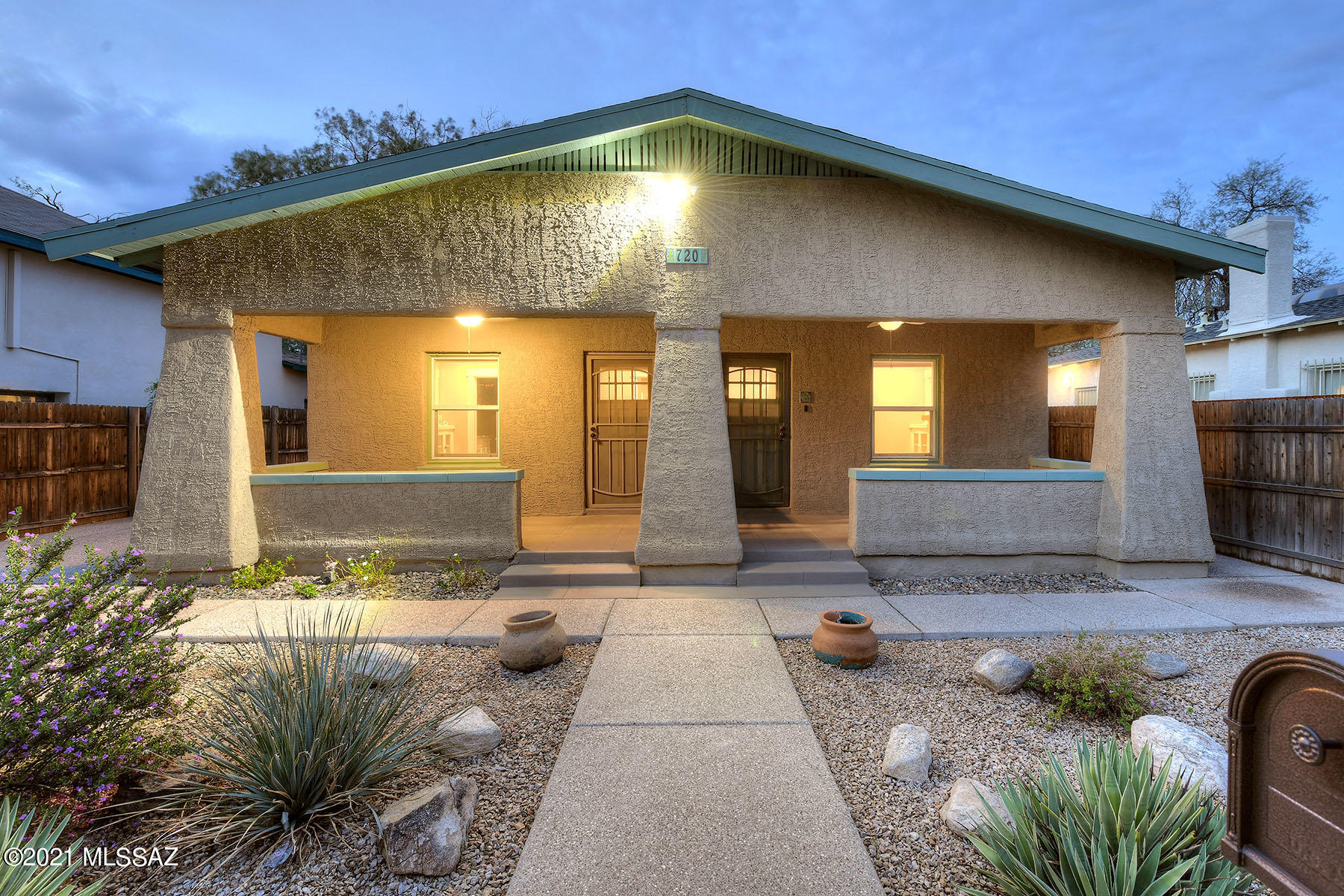 Located in the coveted Iron Horse Historic District, walking distance to downtown restaurants, Tucson's famous 4th Ave with local cafes/shops, the electric rail & the U of A. This light & bright c.1927 home has been carefully renovated & restored with exceptional attention to detail & design. The natural materials, solid original white oak hardwood floors, solid double-brick construction coupled w/beautifully updated kitchen w/granite counters, Cararra Marble backsplash, SS app, large dining/breakfast room, living room plus 3 bedrooms & 3 full modern baths makes this home your ideal sanctuary. HVAC, electrical, copper plumbing, sewer lines, tankless water heater, low-e windows, LED lighting & 3-car carport all installed 2017. Huge R-2 lot allows for a 2nd structure to be built. Owner/agent