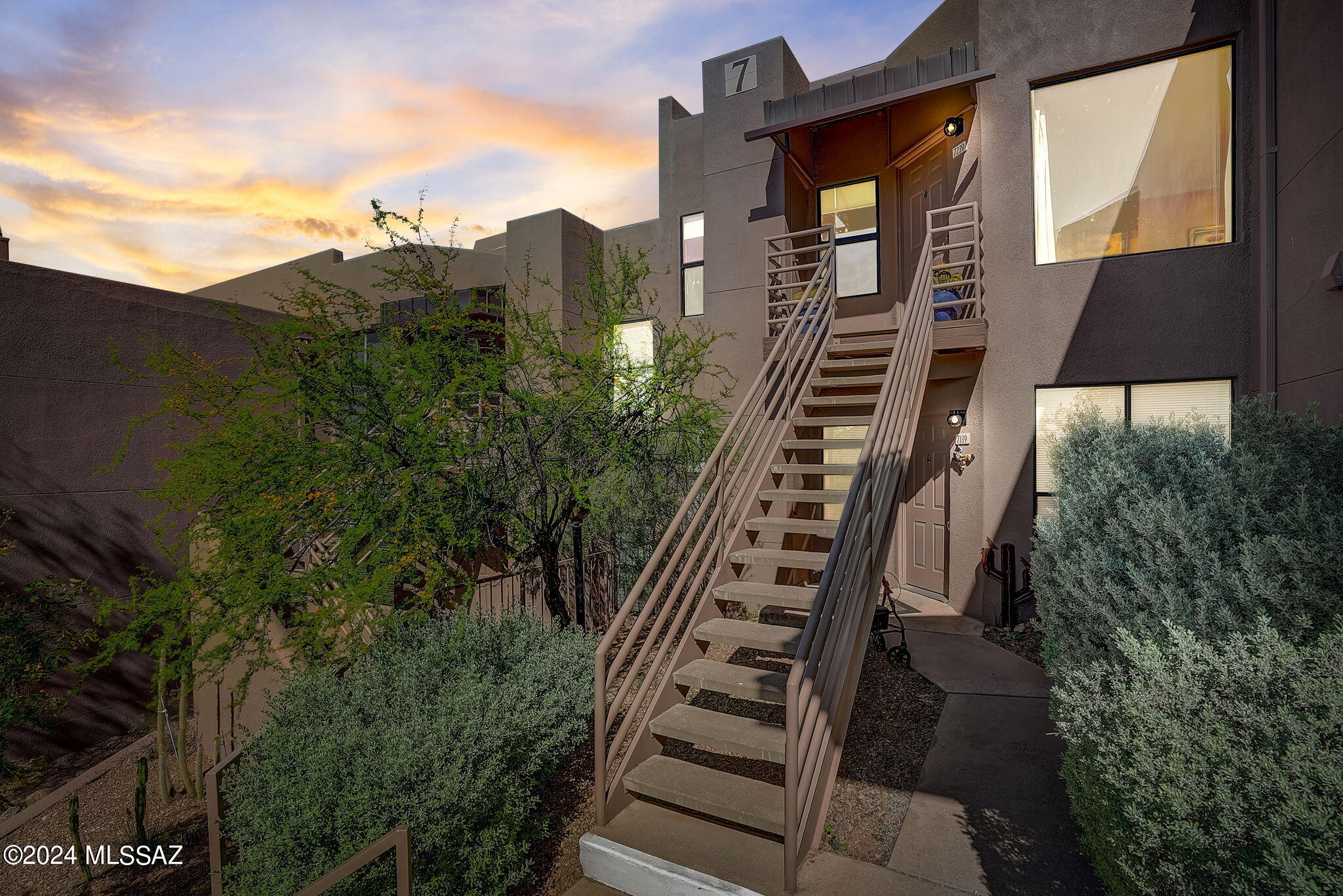 Welcome to your luxurious retreat at Canyon View at Ventana Condominiums! This exquisite 2-bedroom, 2-bathroom condo offers the epitome of elegance and comfort in a highly coveted location. Step inside to discover a gourmet kitchen adorned with custom cabinets crafted by El Dorado design, complemented by aged limestone countertops and Turkish flooring. The kitchen also features stainless steel appliances, including a custom-made wine rack for the wine enthusiast. Relax in the inviting living space highlighted by a cozy wood-burning fireplace and surrounded by multiple picture frame windows, allowing for breathtaking views of the majestic mountains. The community amenities are unparalleled, boasting two pools and spas for ultimate relaxation, two clubhouses equipped with full kitchen that is ideal for hosting gatherings of up to 40 people, and a professional-grade gym furnished with brand new equipment. Outdoor enthusiasts will appreciate the tennis court for friendly matches under the sun. Conveniently located just minutes away from Lowes Ventana Canyon Resort, Sabino Canyon, and the upscale shopping at La Encantada, as well as grocery stores for everyday necessities, this condo offers both luxury and convenience. With its unique character and impeccable features, this home is truly a must-see! Don't miss the opportunity to make it yours and experience resort-style living at its finest. Mounted sound system does not convey.
