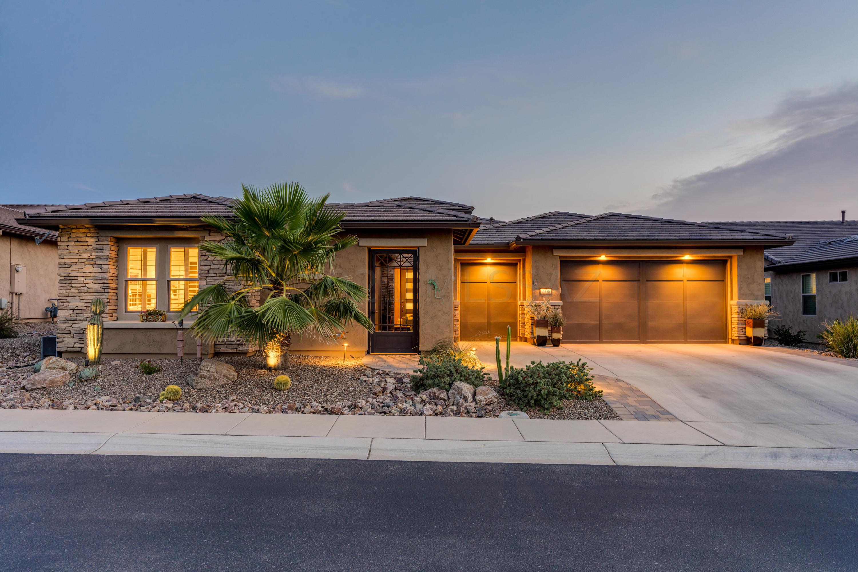 Entertain in grand style in this sophisticated home that magically merges landscape & architecture.  Wonderful sunrise & sunset views, an extended rear patio, ramada, built-in Napoleon BBQ, hot tub, firepit, outside fireplace & TV. The front gated, Zen-like courtyard has a private casita & beckons you to this GORGEOUS home.  From the foyer you look straight through the four sliding glass doors that open onto the extended patio.  So many amazing details in this split floor plan including Swiss & Marten custom cabinetry, GE Monogram SS appliances, three zoned heating/cooling, upgraded central vac & much more (see upgrades list)!  Amazing kitchen:  Quartz countertops, convection wall & microwave, gorgeous cabinets, butler's pantry.  Extended garage w/cabinets, epoxy floor.