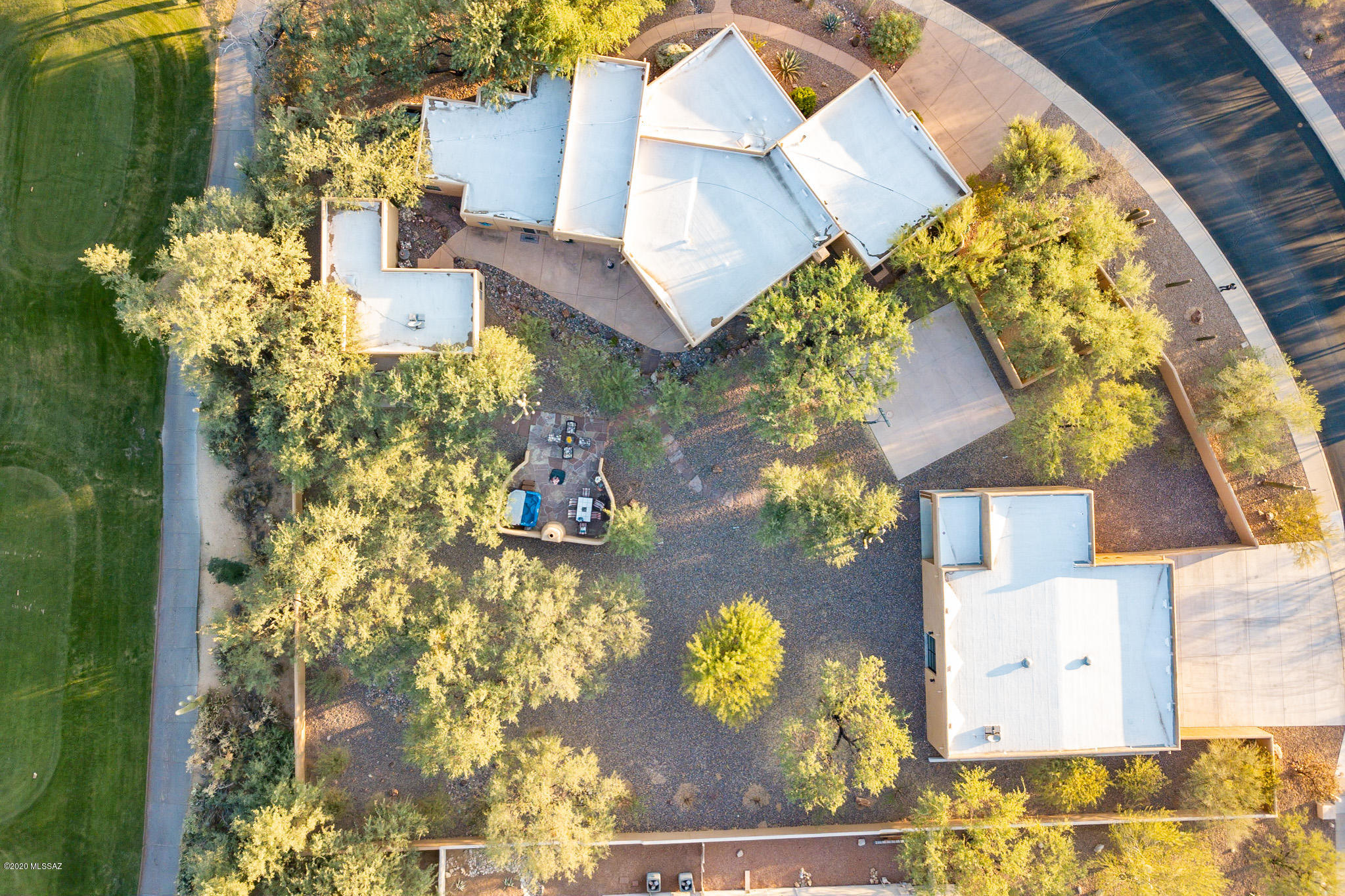 Range Priced $795,000 to $839,000.  ONE of a kind CUSTOM Home (4br/3bath)with GUEST House (2br/1bath), Detached 10 car GARAGE on almost an ACRE GOLF COURSE LOT! Enjoy the PRIVACY of a CORNER lot and the possibilities of Multi-GENERATIONAL LIVING in SABINO SPRINGS/AZ NAT'L PREMIERE GOLF COURSE COMMUNITY. This COMPOUND is completely walled in and consists of 2 lots. Main home features UPGRADES including LUXURIOUS TRAVERTINE tile floors throughout, Soaring Ceilings, FORMAL Living/Dining, Open FAMILY room to GOURMET Kitchen with Breakfast AREA and BAR off the SPACIOUS Covered Patio. LAUNDRY room and OVERSIZED attached 3 car garage. HUGE FREE STANDING 10 car garage with bath, office area and drawings to transform into 2nd Guest House or Separate house on own lot. Amenities just down the street! Private flagstone PATIO with plenty of room for Entertaining with outdoors fireplace and DELUXE JACUZZI brand HOT TUB to enjoy the Starry Nights and Majestic Mountain VIEWS! Basketball court and easy care landscaping make outside living a BREEZE. Amenities include Staffed Security Gate  House, Community Center, Fitness Center, Pool, Spa, Bar and Grill. Award winning tasty food and drink awaits you just down the street with daily specials and heavenly desserts. Close to Shopping, Restaurants, Schools, Salons Gas stations and Banking. Parks, National Forest and Hiking trails are also close by.  Easy access to Downtown and interstate.