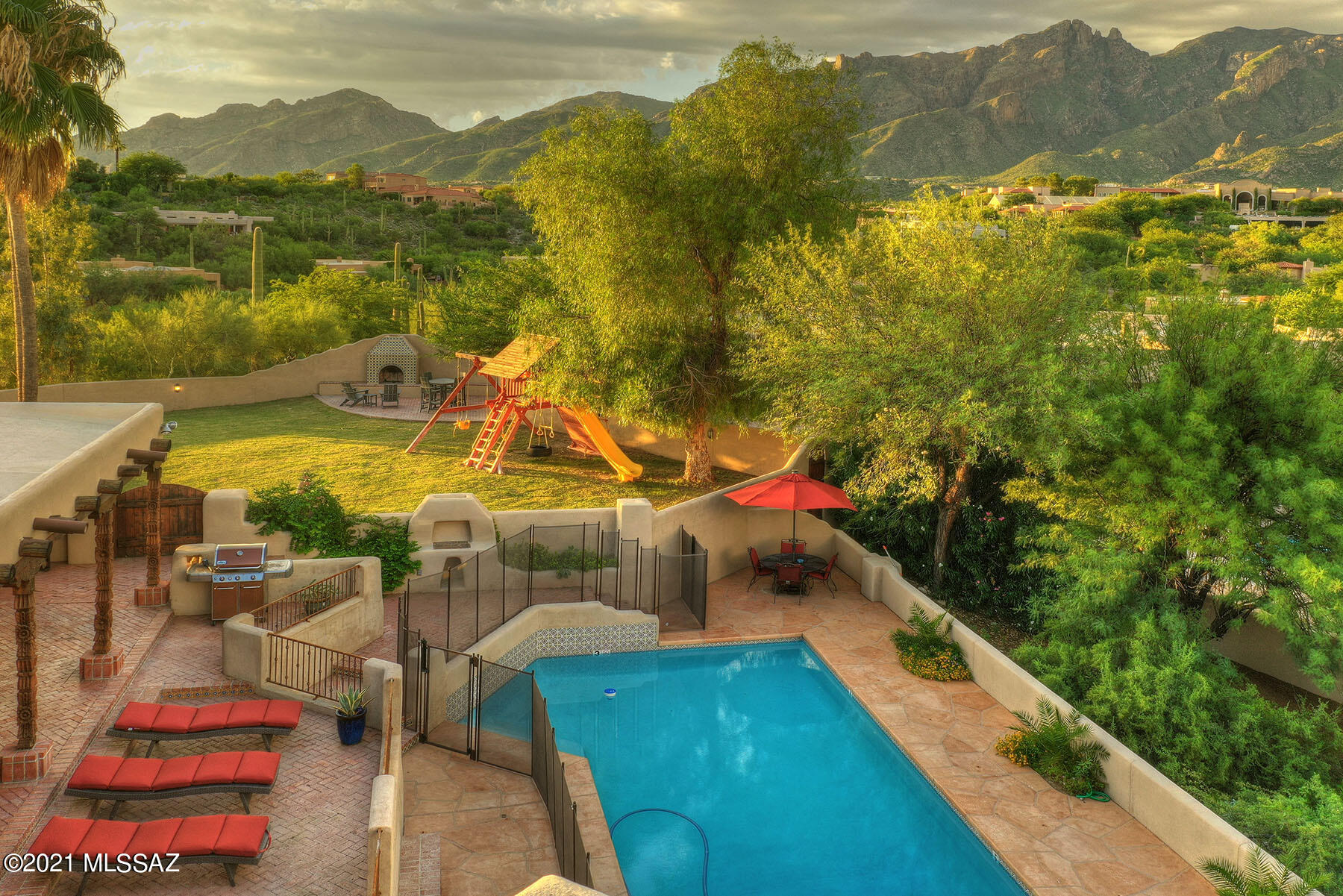 Spectacular UPDATED 5 bdrm MASONRY home, plus HUGE casita in the Old Foothills on 2+ RESORT LIKE acres! Phenomenal premium lot & location, just south of La Paloma on quietest, most private street! INCREDIBLE ATTENTION TO EVERY DETAIL! From the gorgeous wood beams to the new iron casement windows, herringbone brick floors & hand painted Mexican tiles, this home exudes a RARE, MAGICAL WARMTH! Gourmet kitchen w/ VIKING appliances, quartz countertops, fabulous island, breakfast bar & extra large pantry! Master suite is the ultimate experience w/ sitting/music room, 3 luxurious closets w/ built-ins & bonus washer/dryer, & most unbelievably CHARMING bathroom ever! You'll be captivated by the STUNNING views from every windows, the lovely patios & intimate courtyards. TRULY PERFECT LOCATION-WOW!