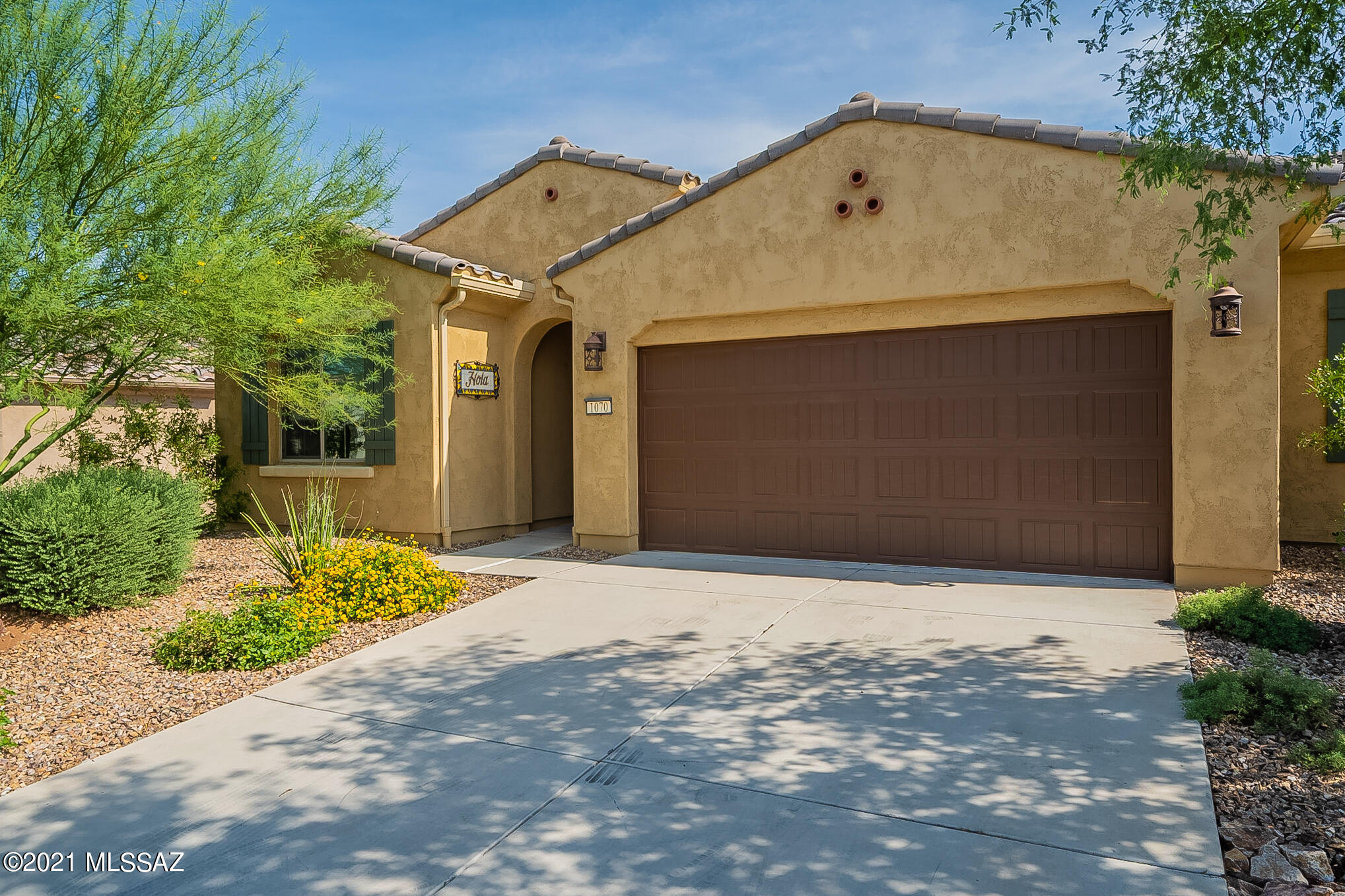 Why Build New when this 4 Year-Old, Primrose Villa is waiting for you?  This home features Quartz Countertops throughout with Upgraded Alder Kitchen Cabinets, Upgraded Backsplash, ''Cashmere'' Dual Granite Sink, 5-Burner Gas Range, GE SS Appliances, Crown Molding, Butler's Pantry, and Roll-Out Waste Receptacle.  The 9' by 3.5' Kitchen Island makes entertaining efficient and fun.  The Den has Custom Doors for privacy and the Owner's Suite features a Generous Walk-In Closet, Dual Sinks in the bathroom and an Upgraded Tile Shower.  New Interior Paint August-2021. Two Car Garage w/Soft Water Loop.