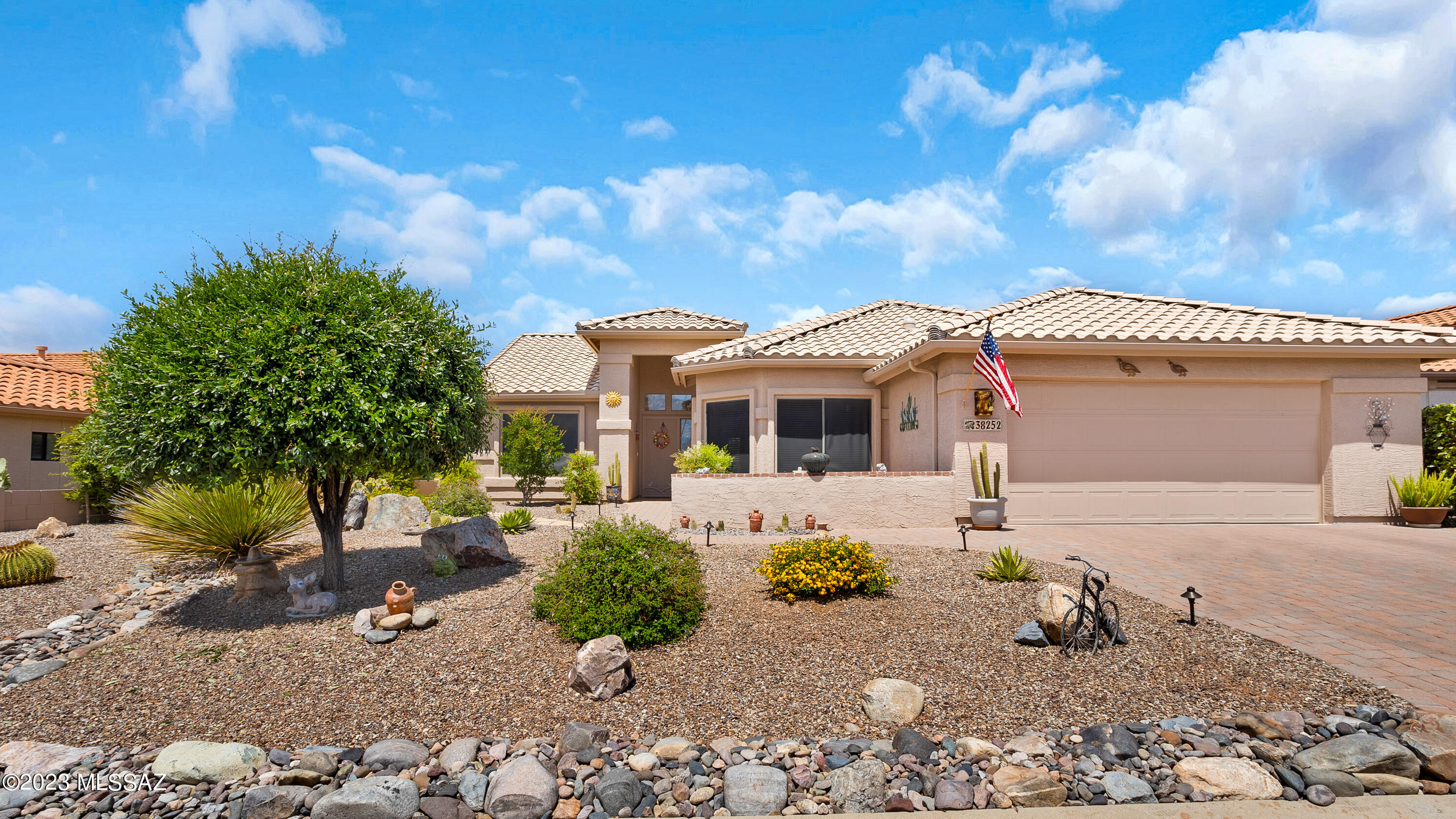 We're Proud to Present this Beautifully Upgraded Laredo. Just what you've been looking for! Great Curb Appeal with Paver Driveway & Courtyard. Spacious Great Room with Slider to Patio. Updated Kitchen offers Granite Counters, High End Stainless Steel Appliances, Expanded Island, & Custom Cabinets. Den/Office Space. Owner's Suite has Upgraded Bathroom with Custom Shower & Cabinetry. Den/Office. Guest Bedroom with Closet & Bathroom nearby. Laundry Room has solar tube & extra cabinets! 2 Car Garage has solar tube, utility sink, cabinets & Water Softener. New Roof Underlayment May 2023. Covered Back Patio with extended Pavers & Ramada. Park like Gated Yard, Built-in BBQ, Water Feature, Putting Green & Fruit Trees to enjoy day or night. Welcome Home!